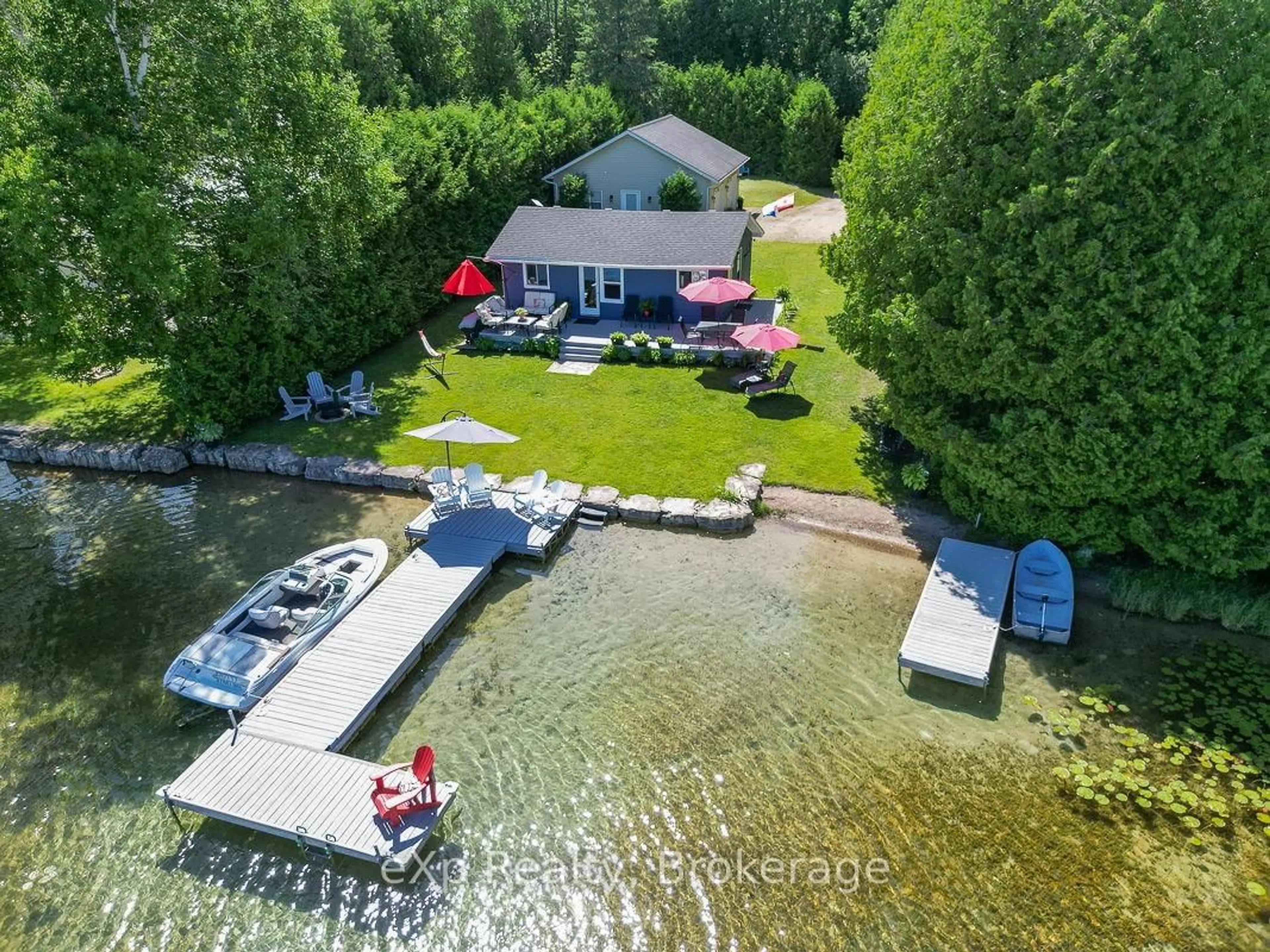 A pic from outside/outdoor area/front of a property/back of a property/a pic from drone, water/lake/river/ocean view for 135 Lakeview Rd, Chatsworth Ontario N0H 1G0