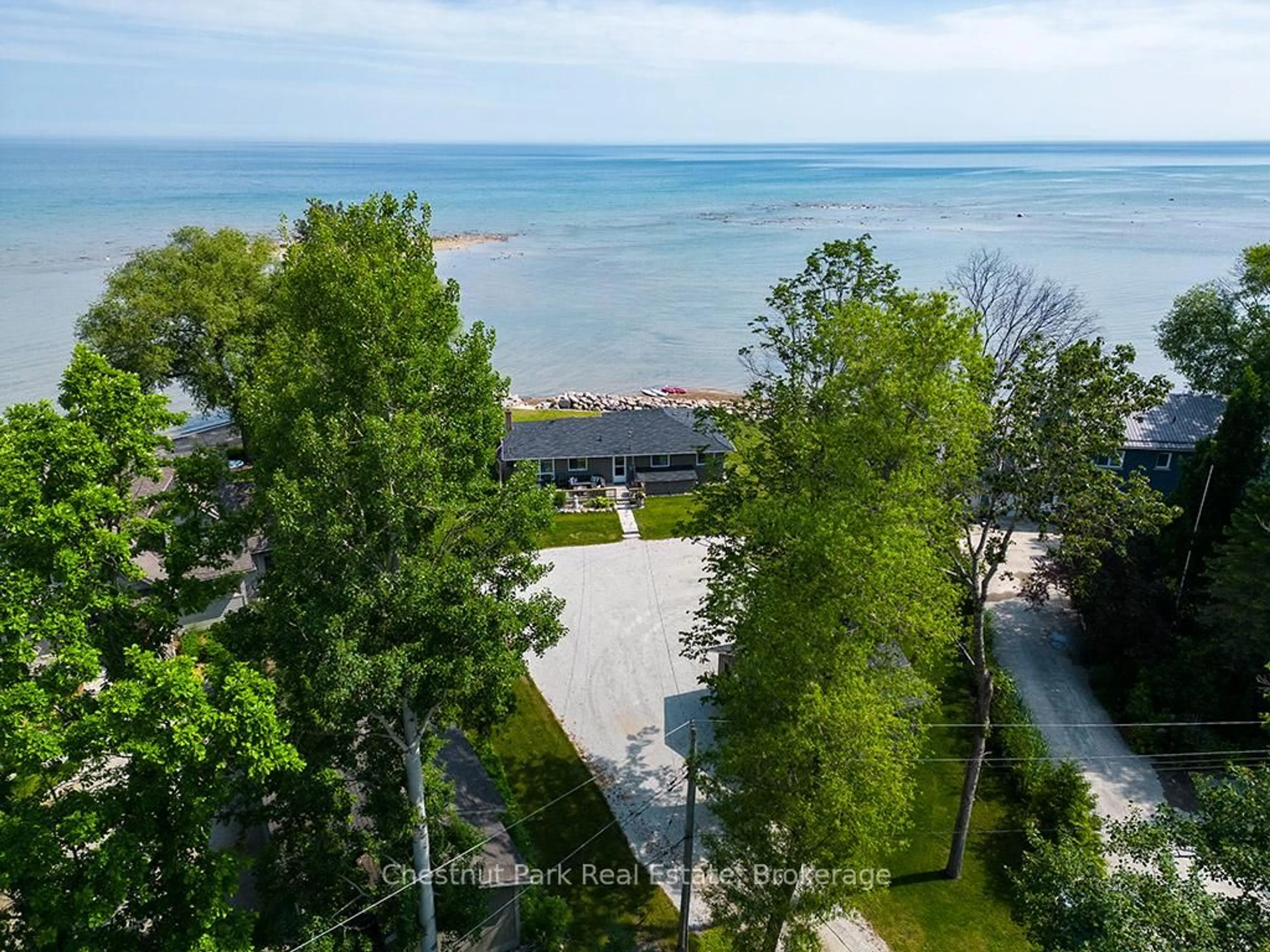 A pic from outside/outdoor area/front of a property/back of a property/a pic from drone, water/lake/river/ocean view for 139 Teskey Dr, Blue Mountains Ontario N0H 1J0