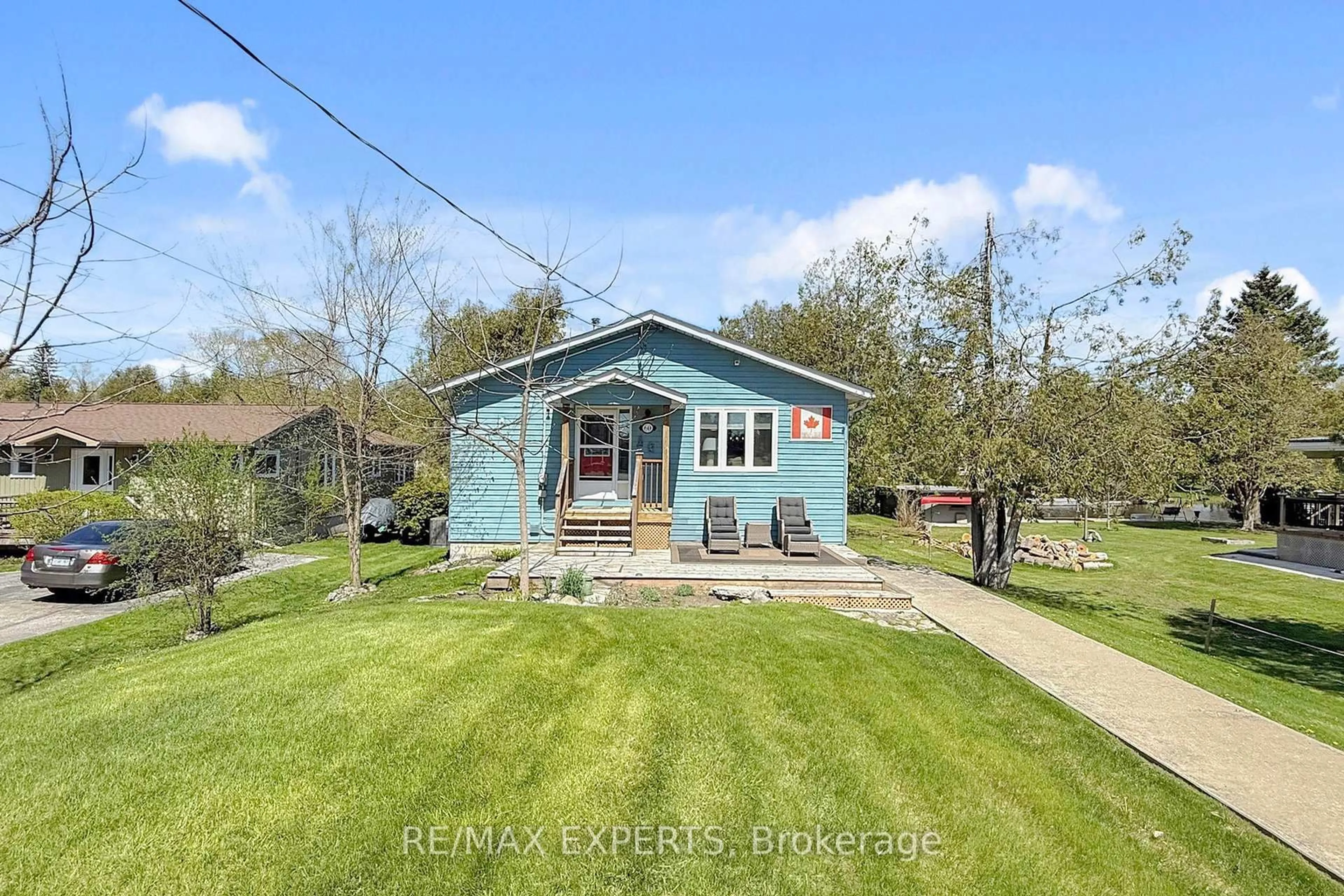 A pic from outside/outdoor area/front of a property/back of a property/a pic from drone, water/lake/river/ocean view for 60 River Dr, Kawartha Lakes Ontario K0M 1N0