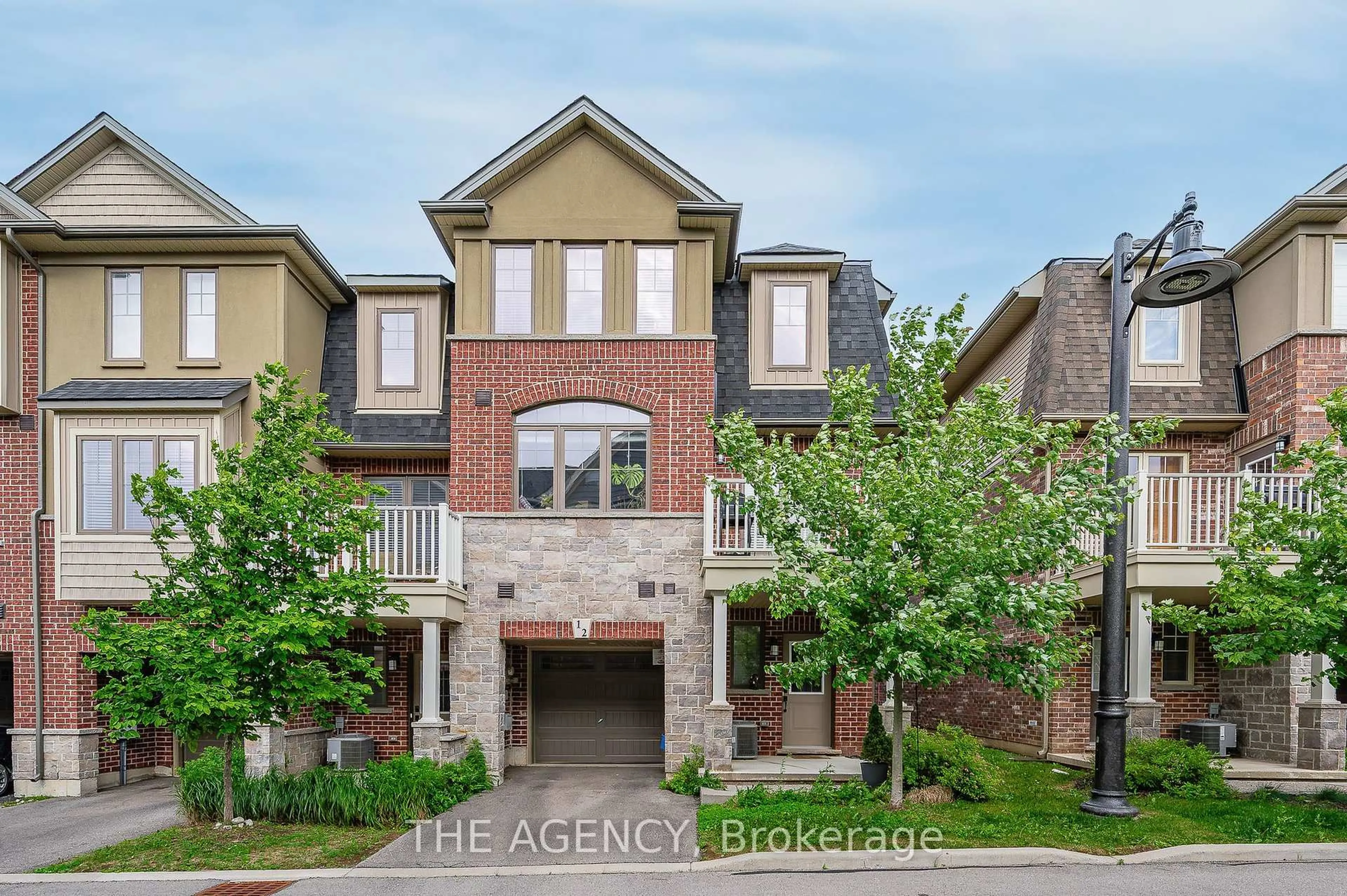 Home with brick exterior material, street for 12 Birot Lane, Hamilton Ontario L9K 0K1