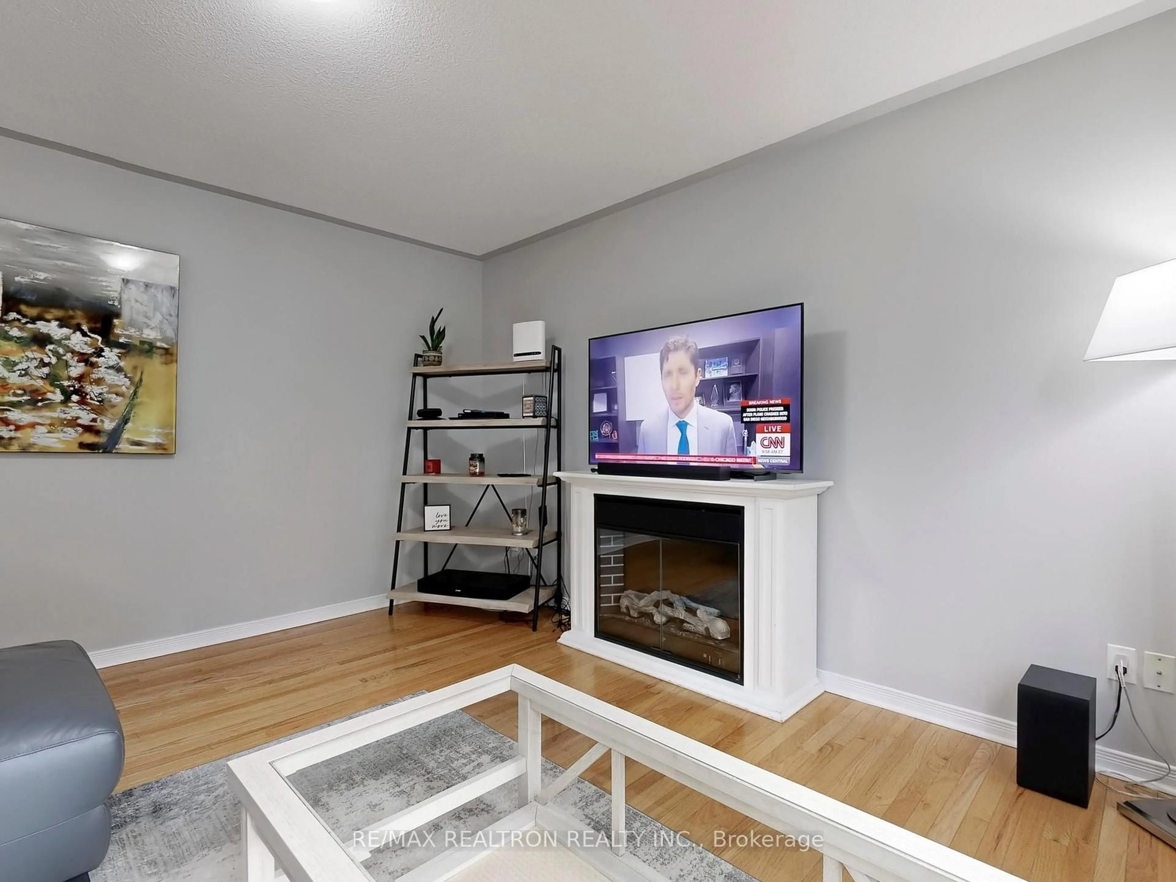 Living room with furniture, wood/laminate floor for 50 Cook St, Kawartha Lakes Ontario K9V 0C6