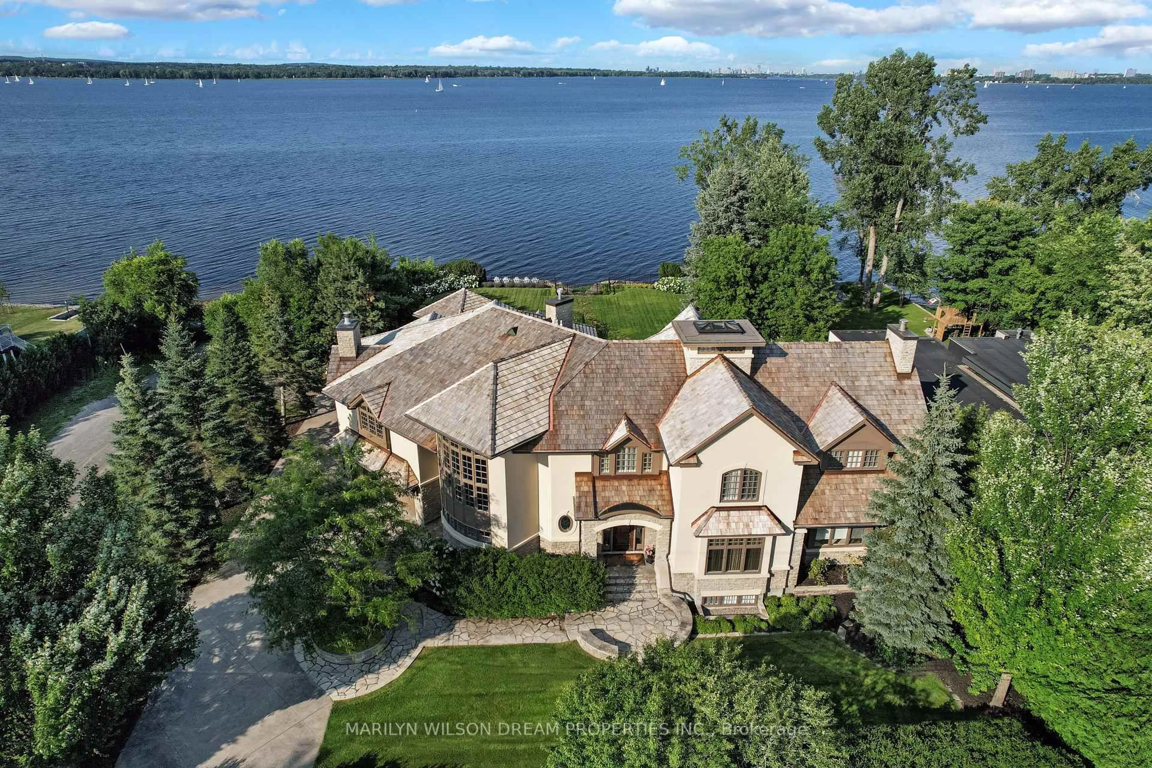 A pic from outside/outdoor area/front of a property/back of a property/a pic from drone, water/lake/river/ocean view for 113 Grandview Rd, Ottawa Ontario K2H 8B7