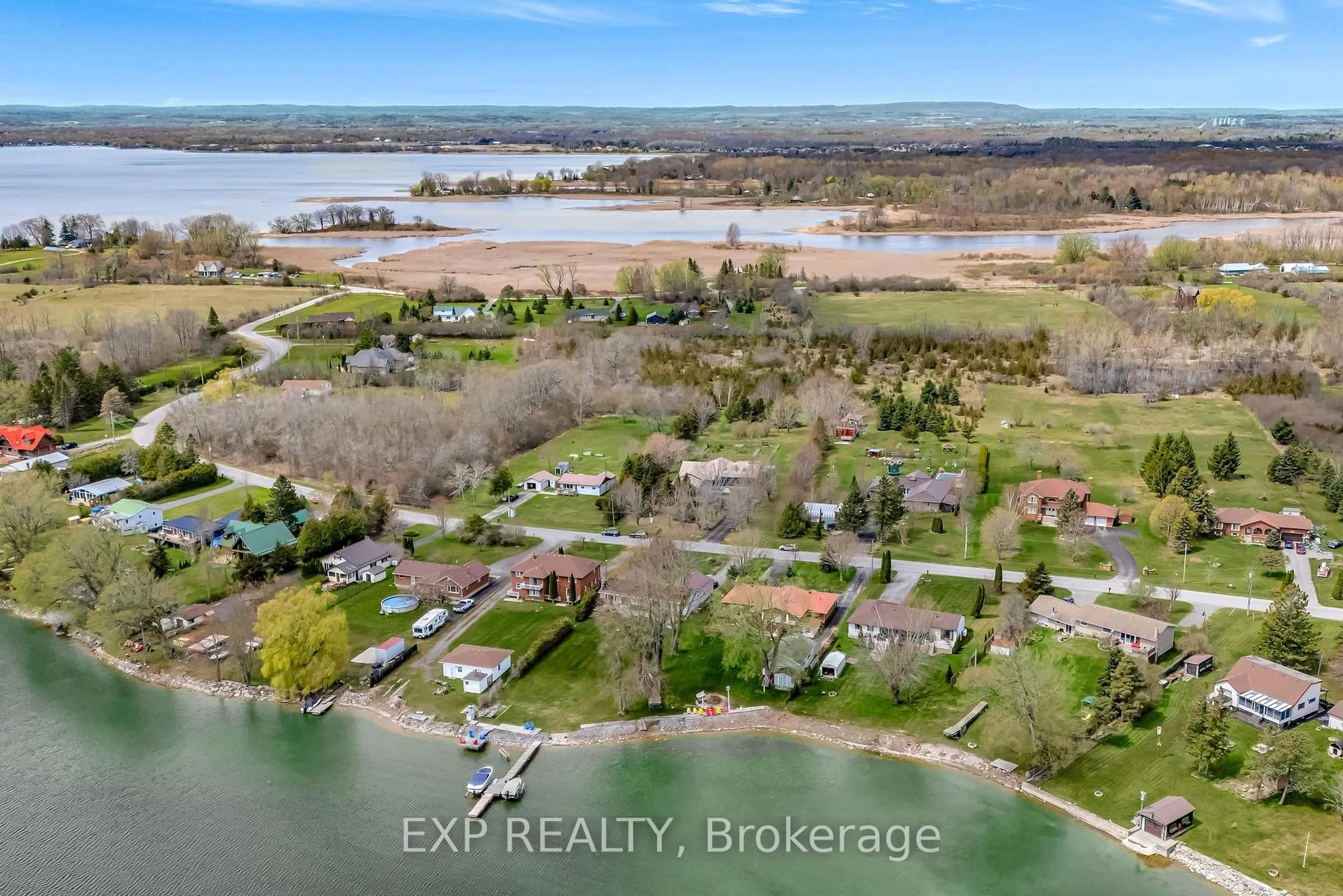 A pic from outside/outdoor area/front of a property/back of a property/a pic from drone, water/lake/river/ocean view for 135 Hiscock Shores Rd, Prince Edward County Ontario K0K 1L0