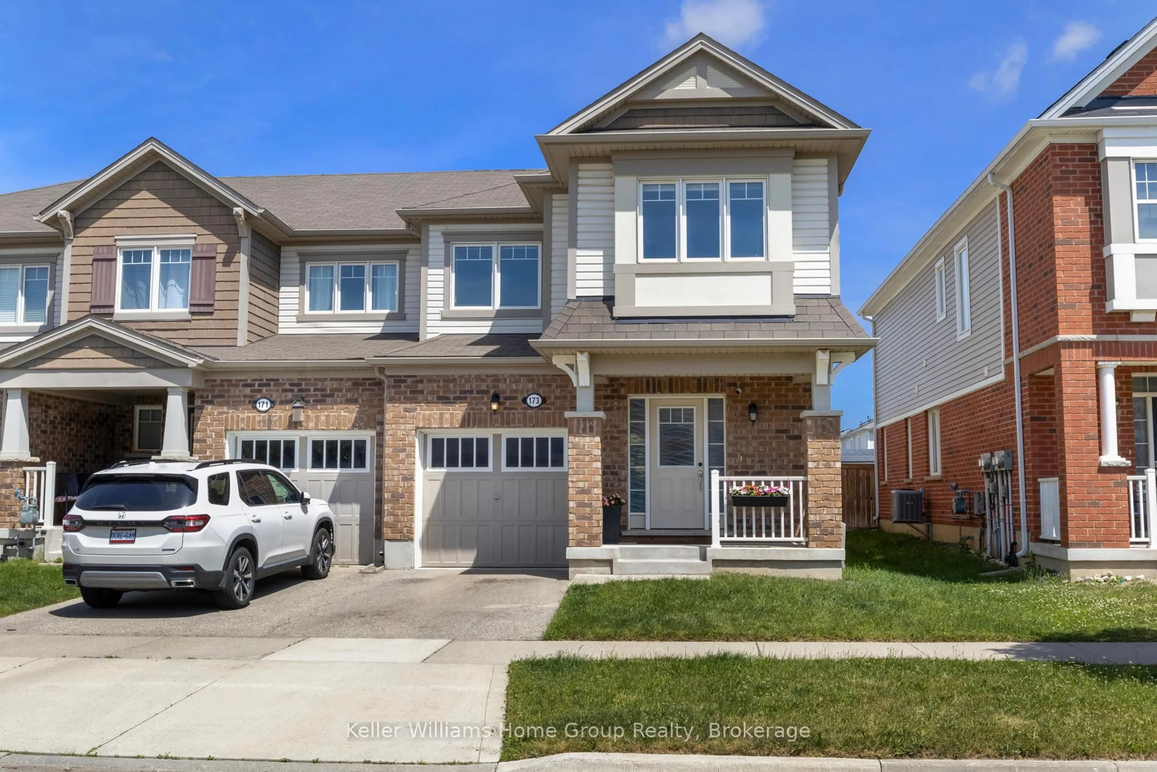 Home with brick exterior material, street for 173 West Oak Tr, Kitchener Ontario N2R 0J3