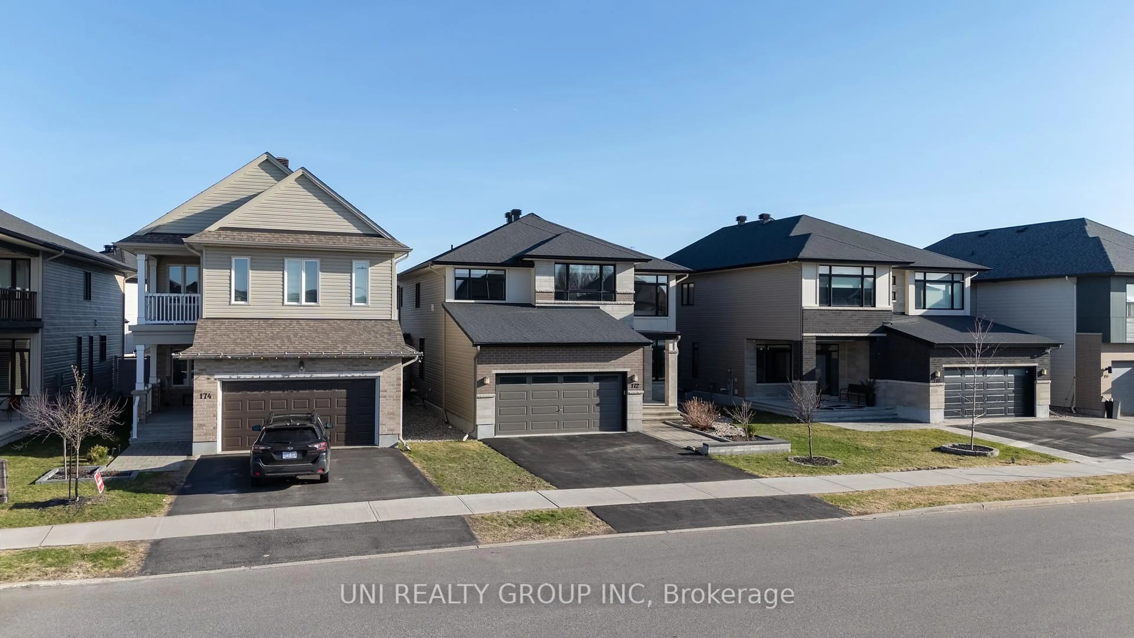 A pic from outside/outdoor area/front of a property/back of a property/a pic from drone, street for 172 Cambie Rd, Ottawa Ontario K1X 0A7