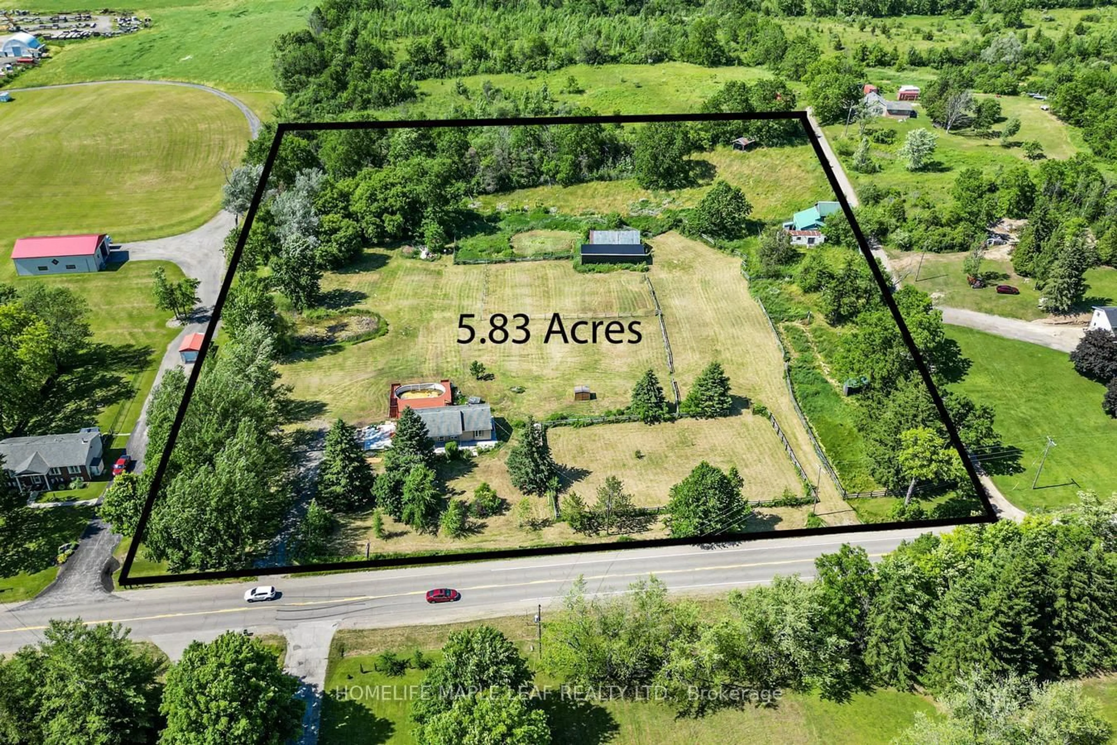 A pic from outside/outdoor area/front of a property/back of a property/a pic from drone, street for 927 #97 Regional Rd, Hamilton Ontario L0R 1K0