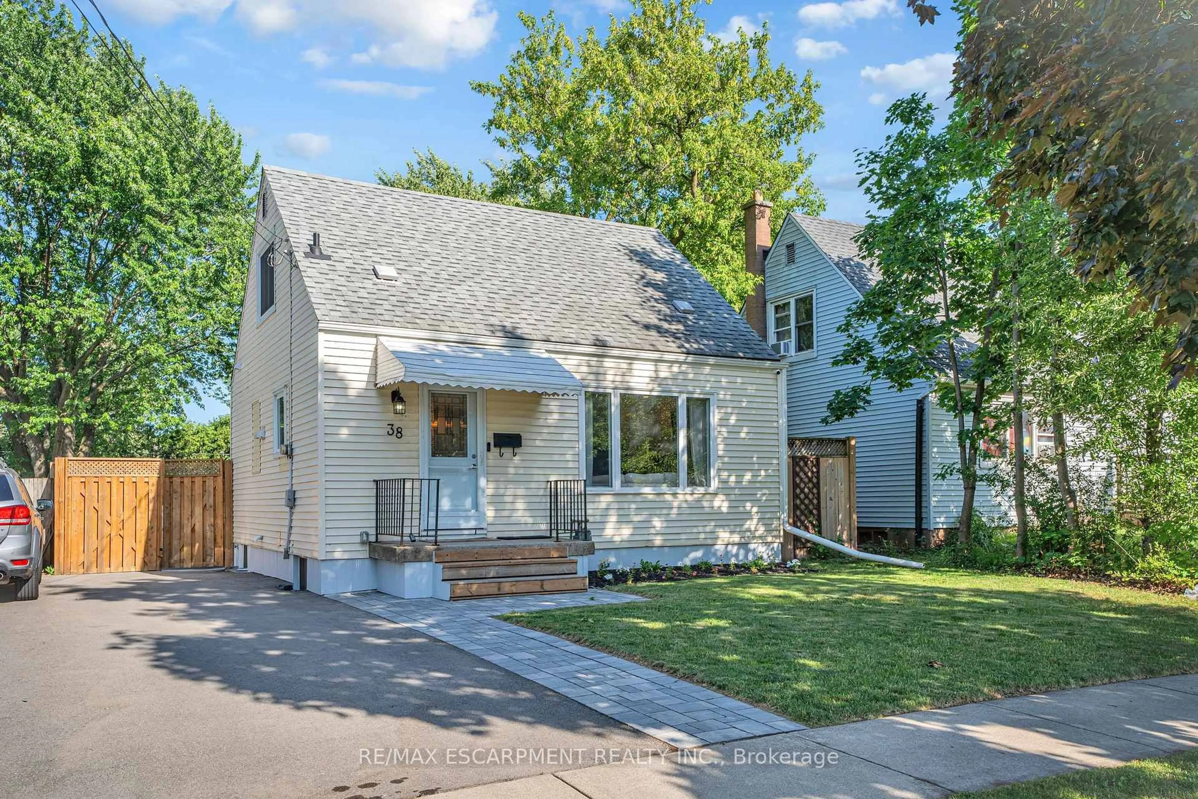 Home with brick exterior material, street for 38 Eastvale Pl, Hamilton Ontario L8H 1P1