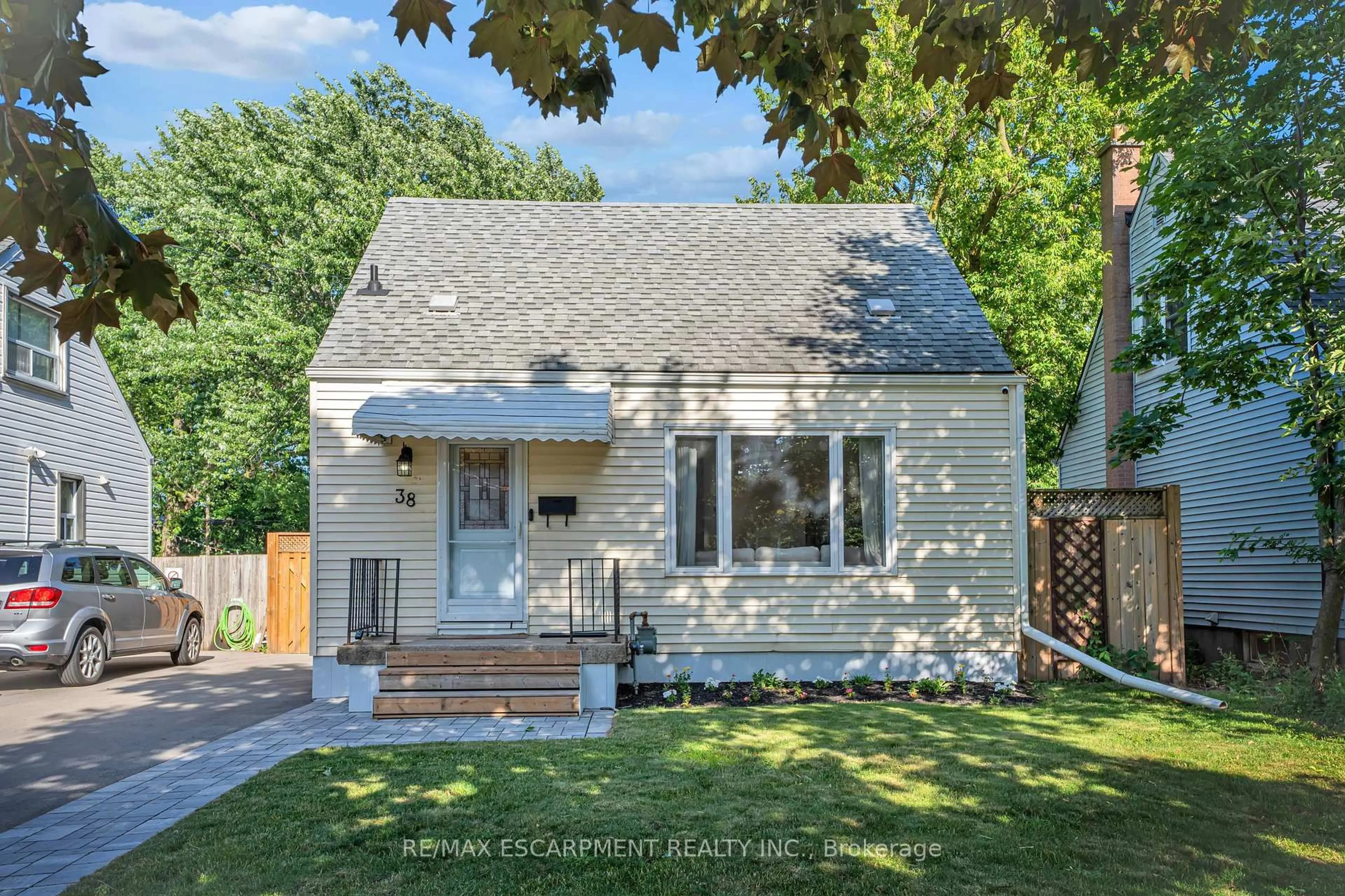 Home with brick exterior material, street for 38 Eastvale Pl, Hamilton Ontario L8H 1P1