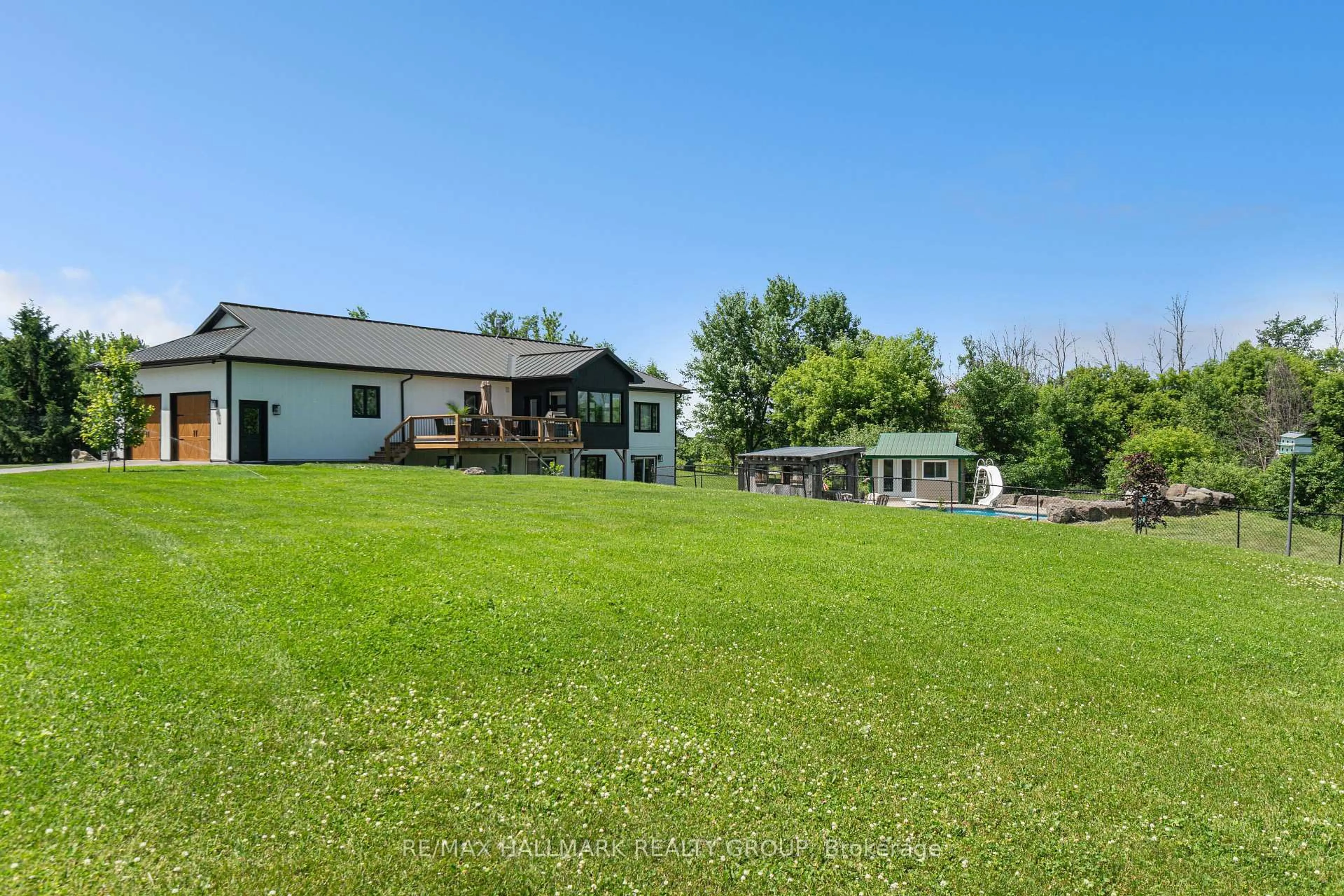 A pic from outside/outdoor area/front of a property/back of a property/a pic from drone, water/lake/river/ocean view for 422 Old Coach Rd, Carp Ontario K0A 1L0