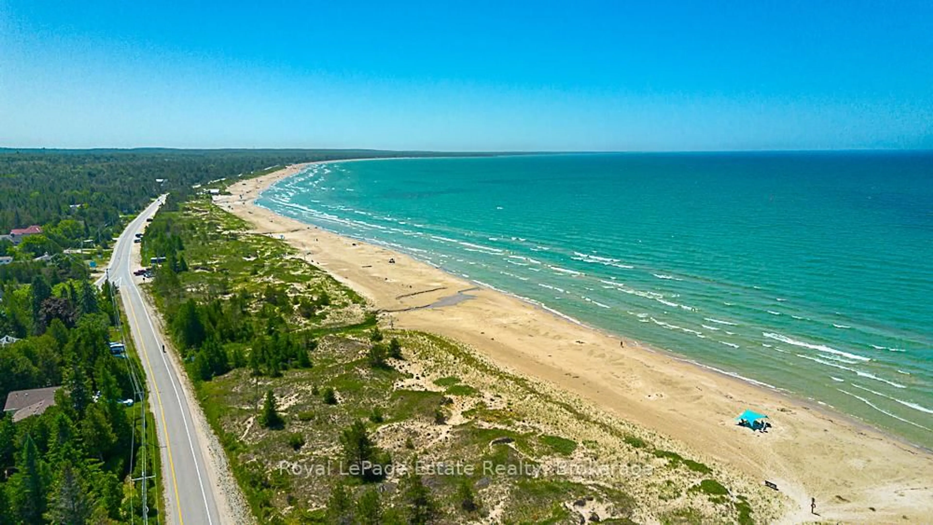 A pic from outside/outdoor area/front of a property/back of a property/a pic from drone, water/lake/river/ocean view for 1007 Lakeshore Blvd, South Bruce Peninsula Ontario N0H 2G0
