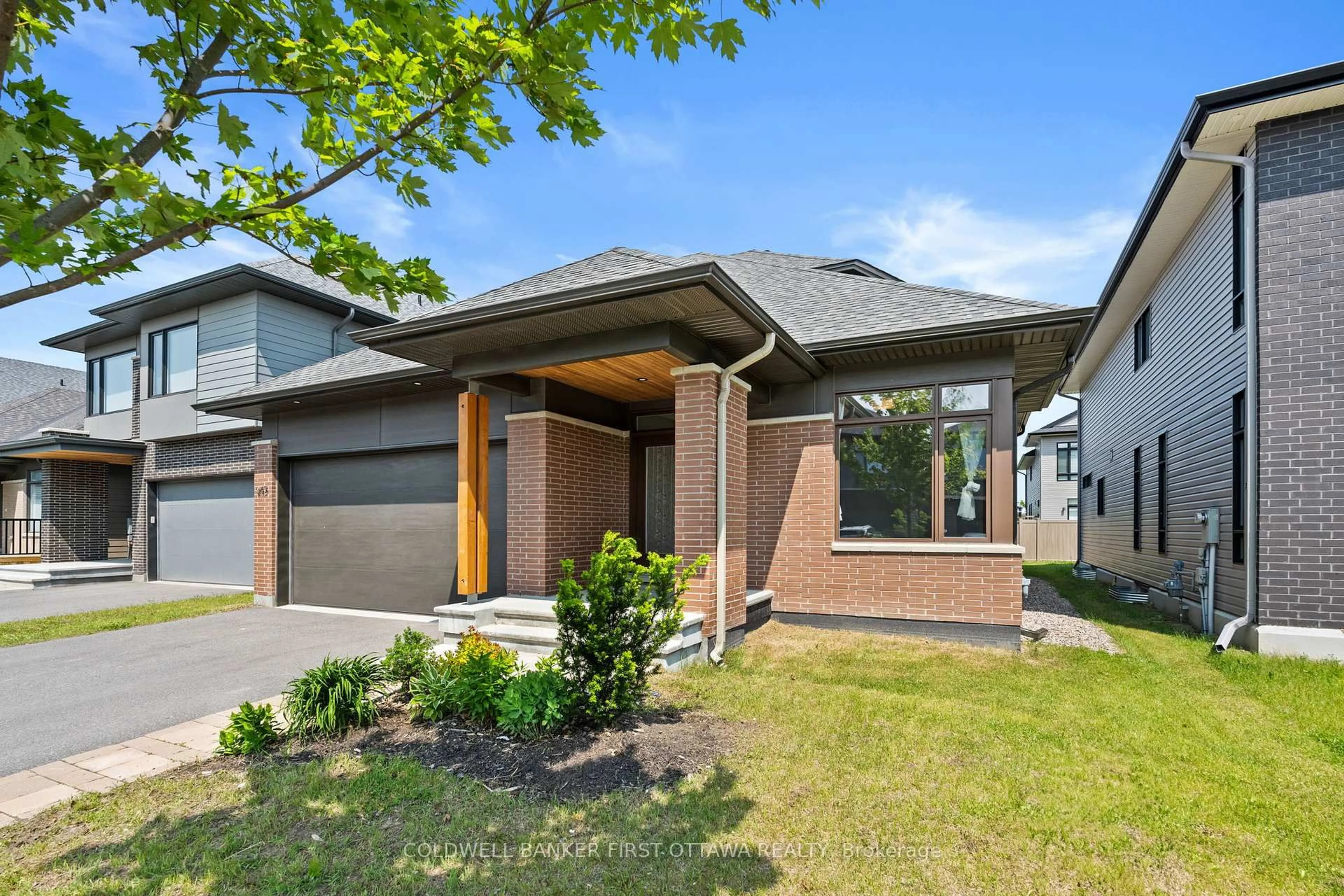 Home with brick exterior material, street for 945 ISLINGTON Way, Ottawa Ontario K1T 0T7