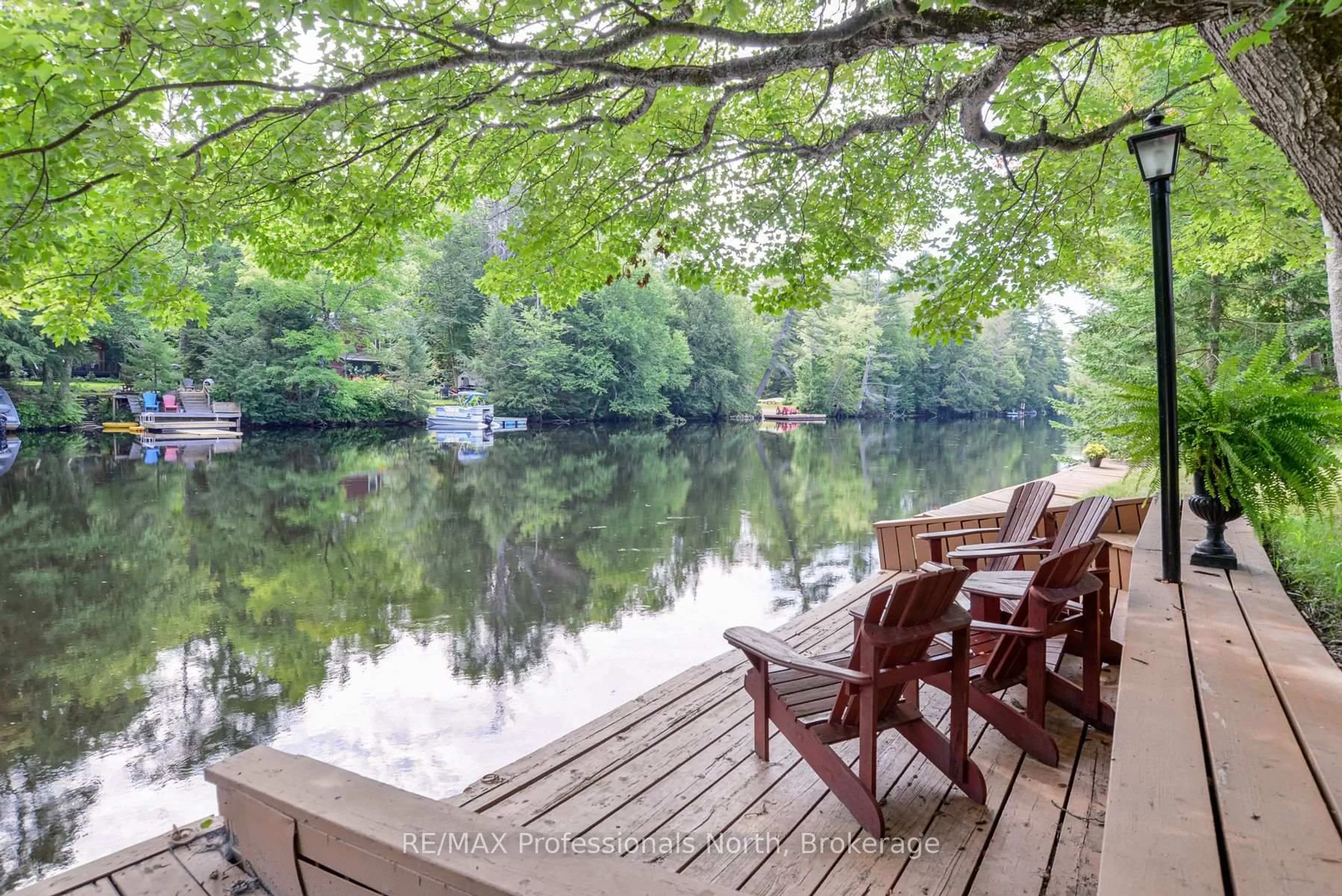 Patio, water/lake/river/ocean view for 1074 Holiday Park Dr, Bracebridge Ontario P1L 1W9