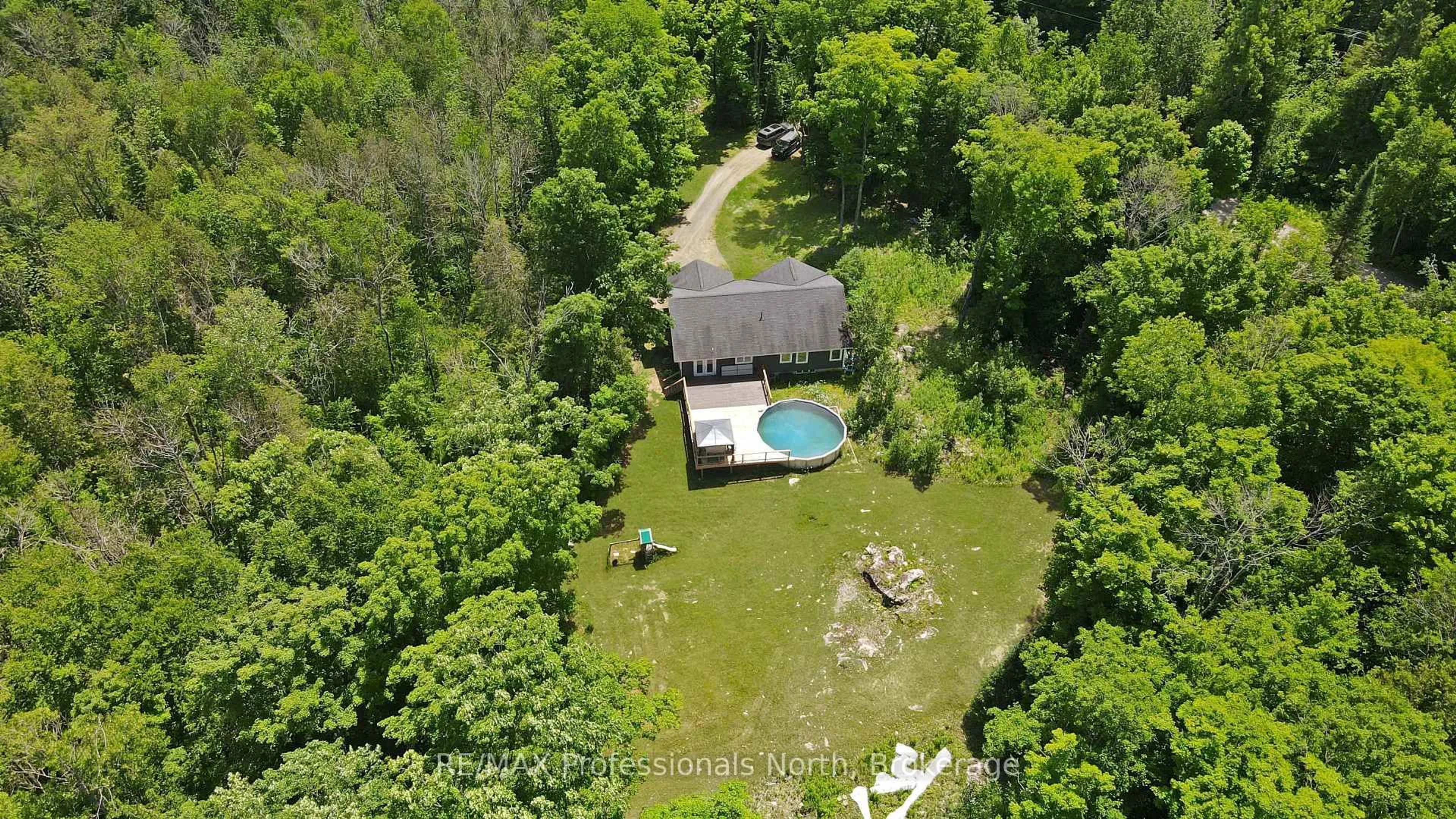 A pic from outside/outdoor area/front of a property/back of a property/a pic from drone, unknown for 1979 Blairhampton Rd, Minden Hills Ontario K0M 2K0