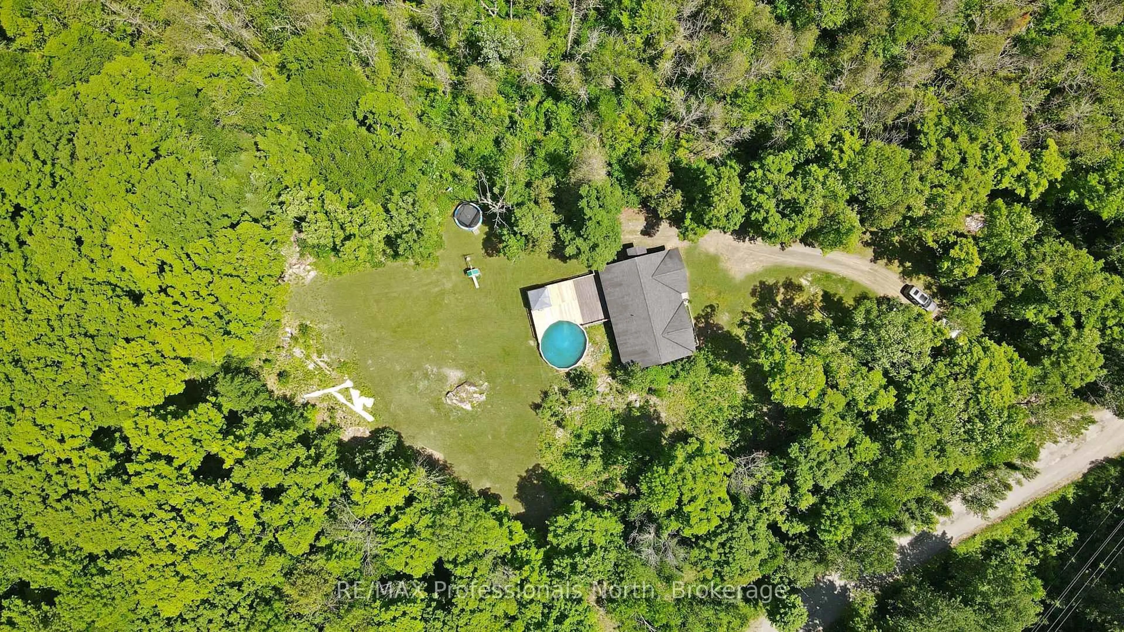 A pic from outside/outdoor area/front of a property/back of a property/a pic from drone, water/lake/river/ocean view for 1979 Blairhampton Rd, Minden Hills Ontario K0M 2K0