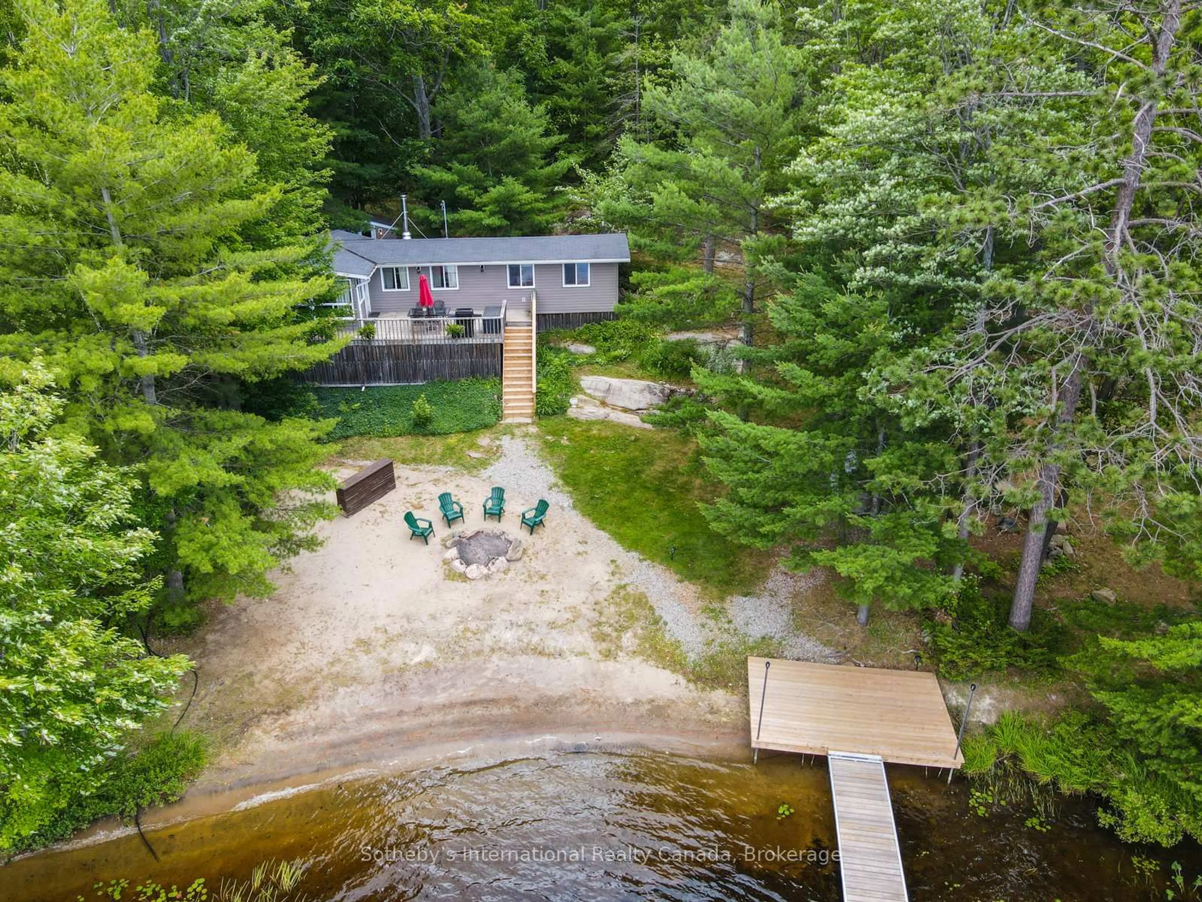 A pic from outside/outdoor area/front of a property/back of a property/a pic from drone, water/lake/river/ocean view for 1040 Kahshe Lake, Gravenhurst Ontario P0E 1G0
