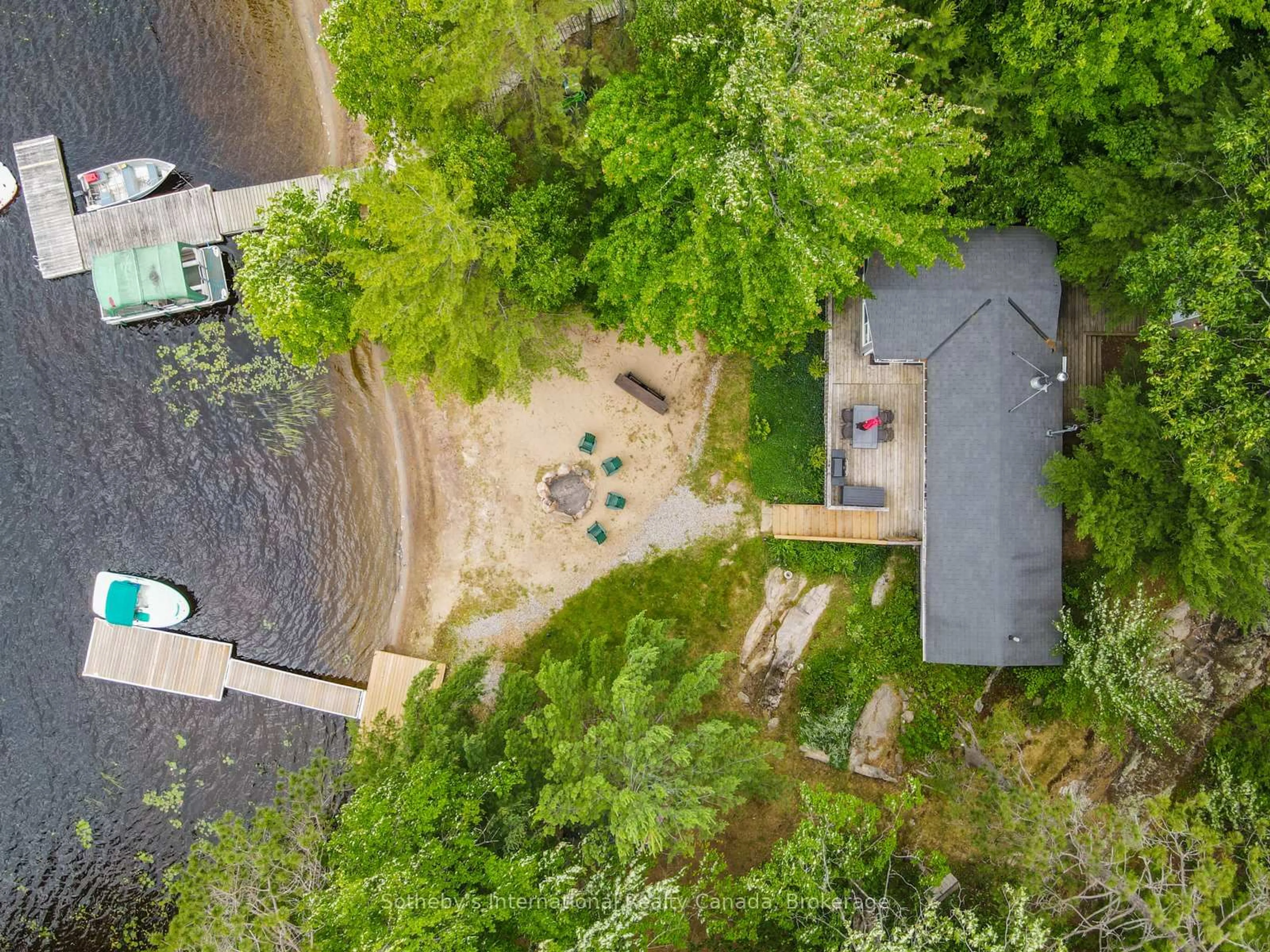 A pic from outside/outdoor area/front of a property/back of a property/a pic from drone, forest/trees view for 1040 Kahshe Lake, Gravenhurst Ontario P0E 1G0