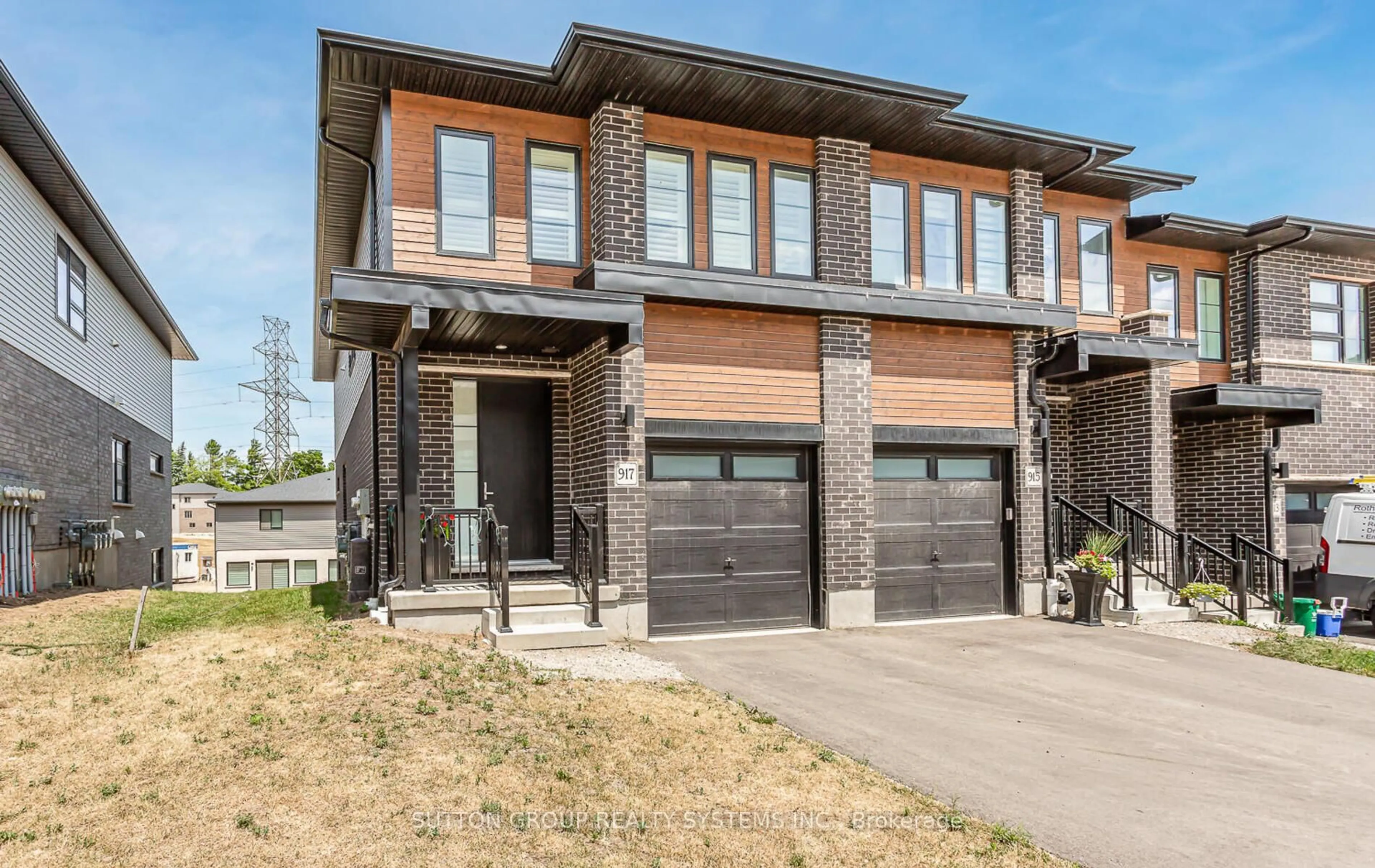 Home with brick exterior material, street for 917 Robert Ferrie Dr, Kitchener Ontario N2R 0P2