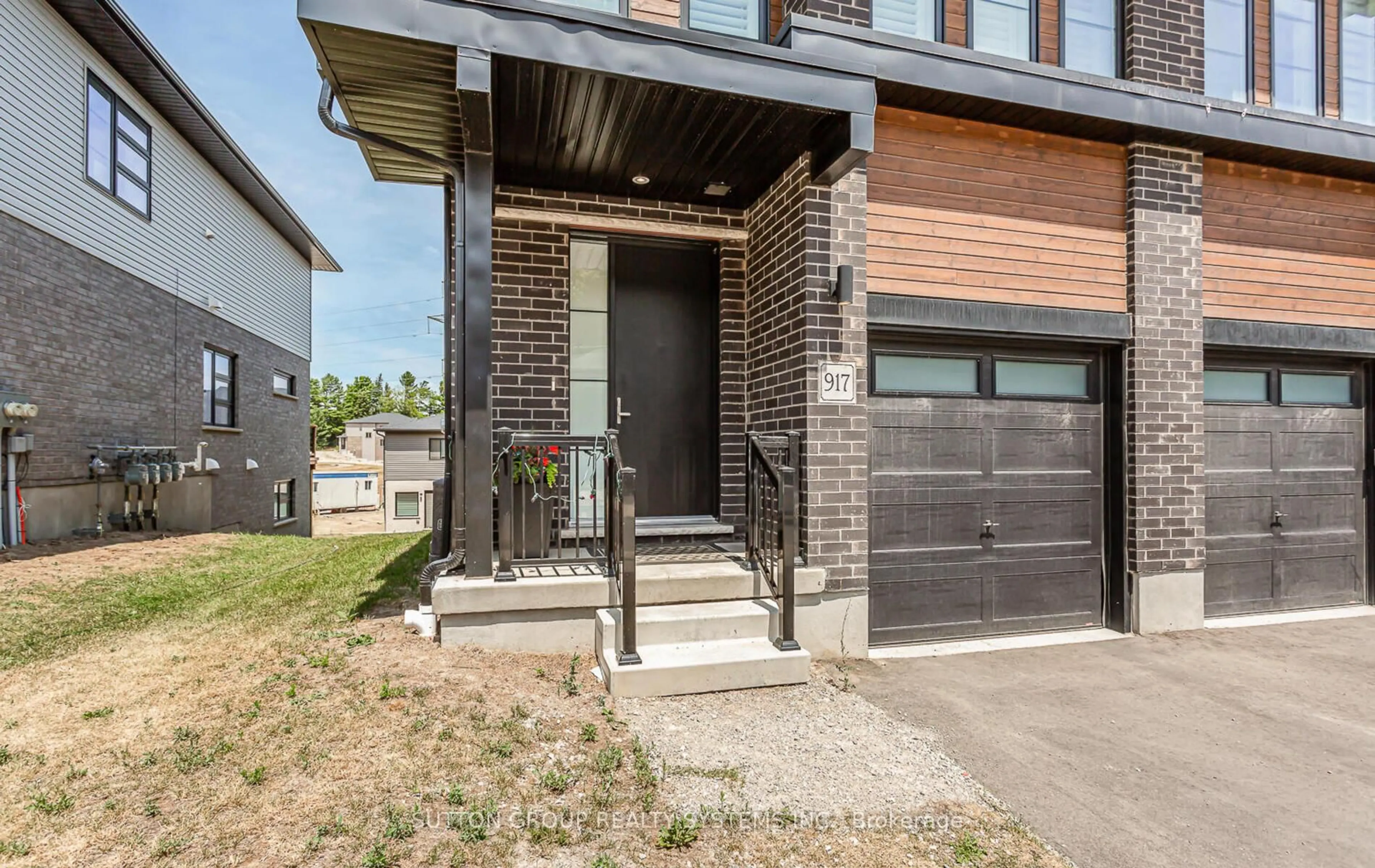 Home with brick exterior material, street for 917 Robert Ferrie Dr, Kitchener Ontario N2R 0P2