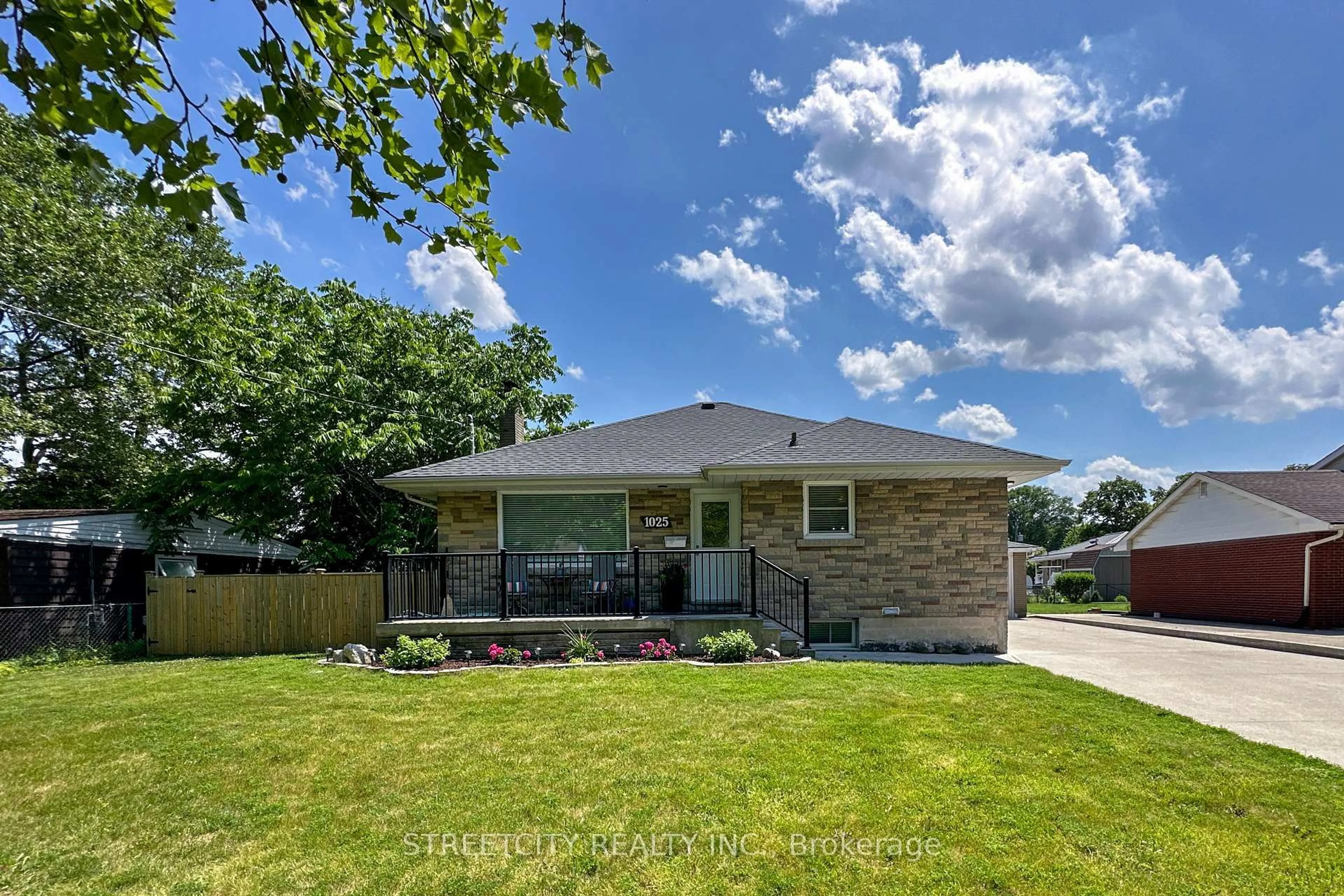 Home with brick exterior material, street for 1025 Kensington Blvd, Sarnia Ontario N7S 1N3