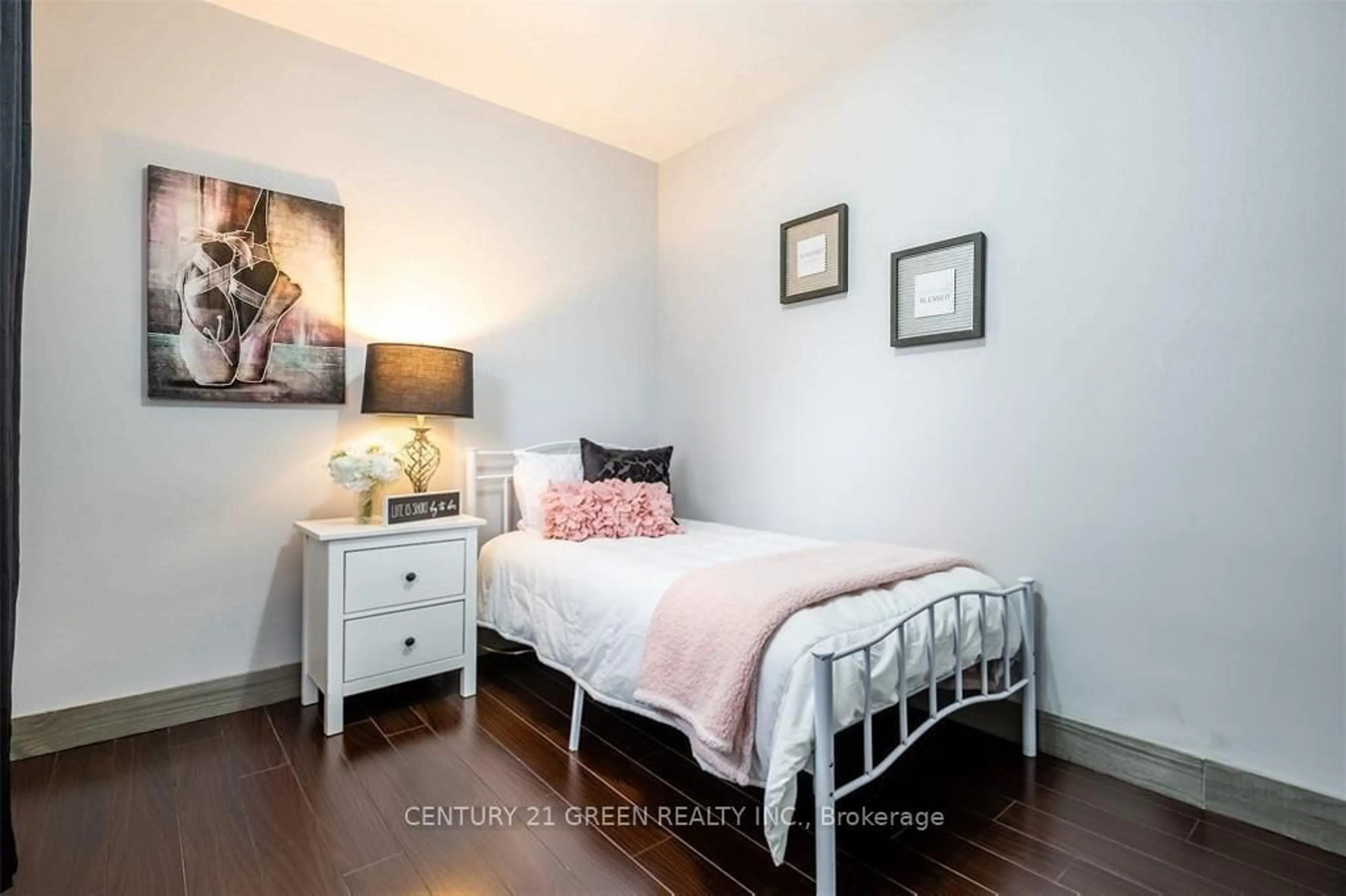 Bedroom with bed, wood/laminate floor for 217 Mayfield Ave, Waterloo Ontario N2J 3S6
