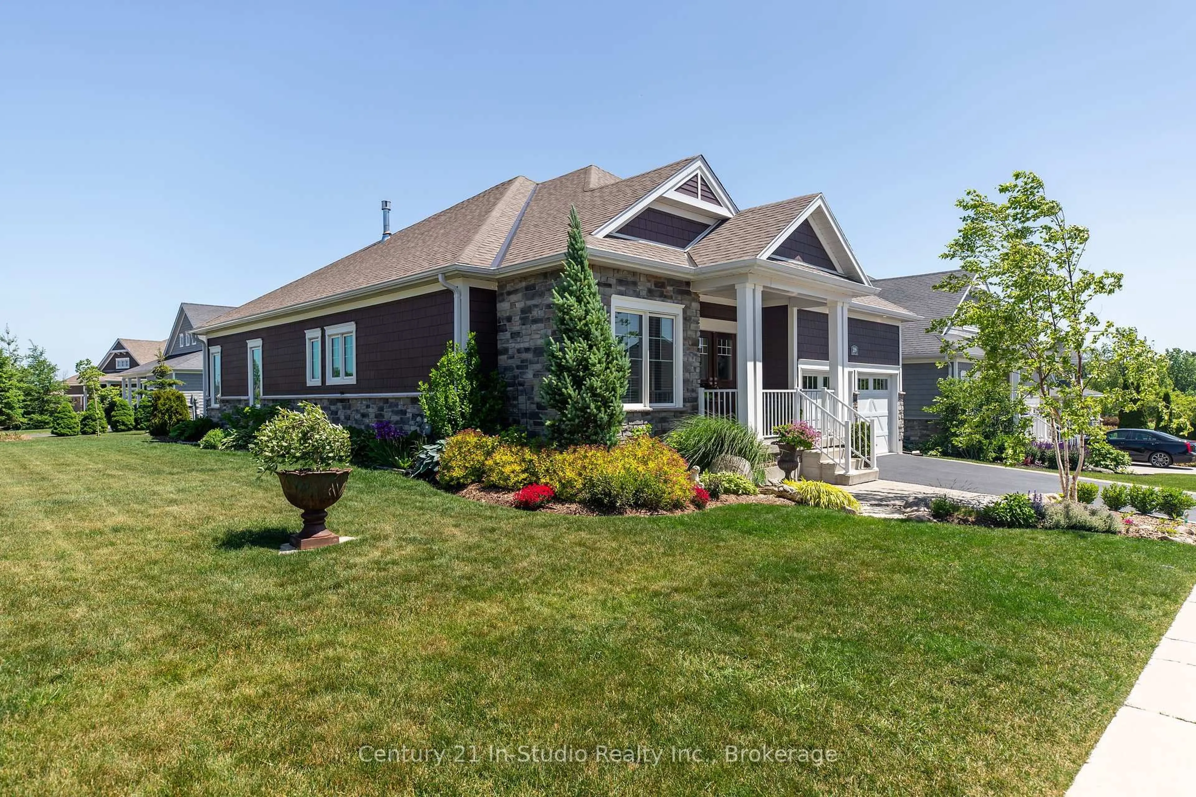 Home with vinyl exterior material, street for 209 Snowberry Lane, Georgian Bluffs Ontario N0H 1S0