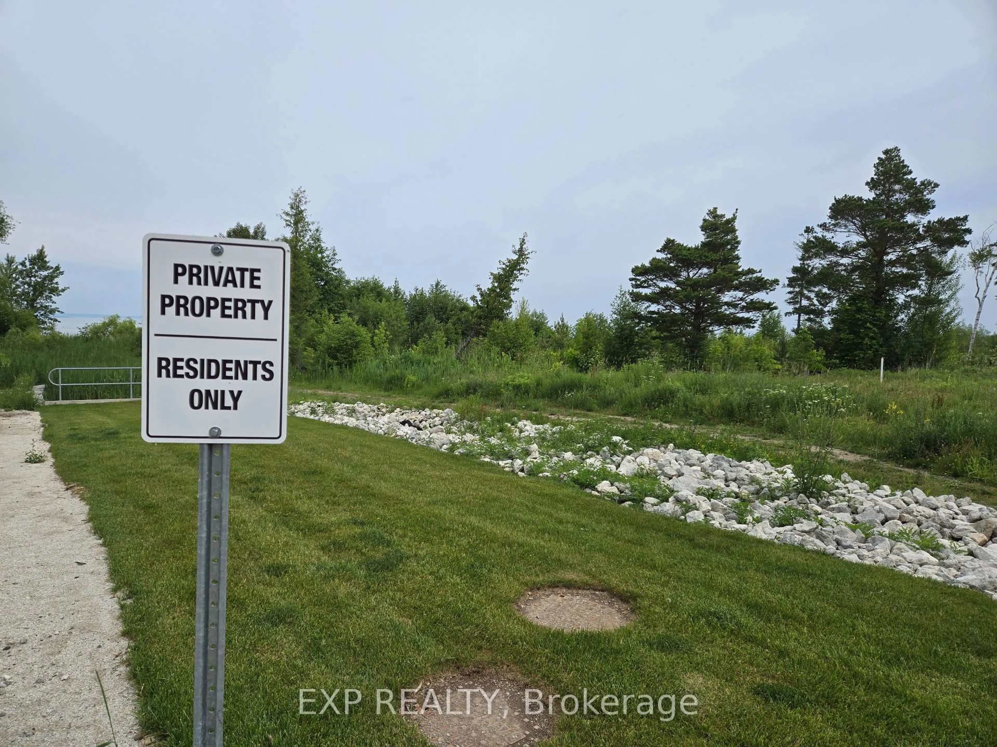 A pic from outside/outdoor area/front of a property/back of a property/a pic from drone, forest/trees view for 107 Rosie St, Blue Mountains Ontario N0H 1J0