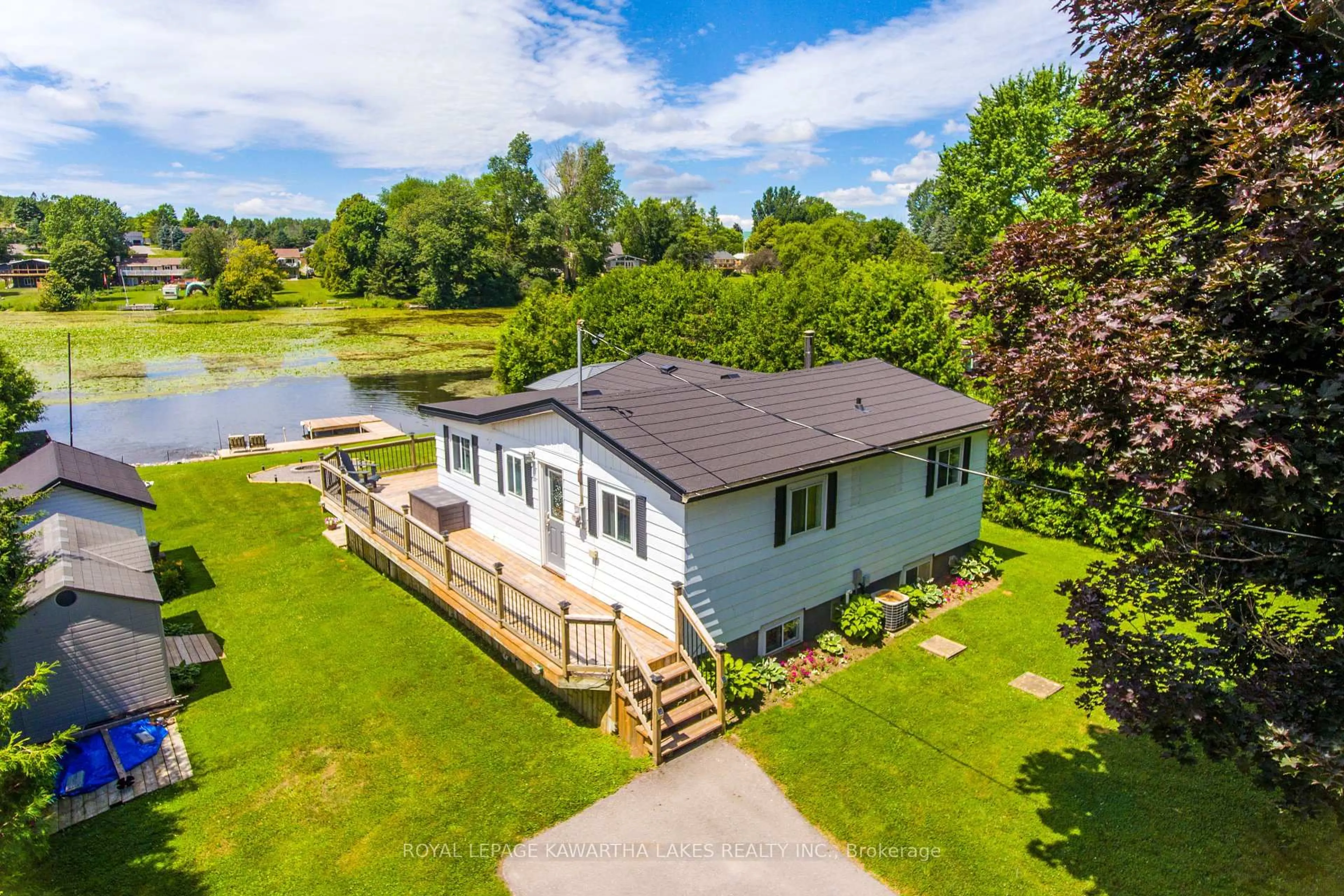 A pic from outside/outdoor area/front of a property/back of a property/a pic from drone, water/lake/river/ocean view for 28 Cadillac Blvd, Kawartha Lakes Ontario K0L 2W0