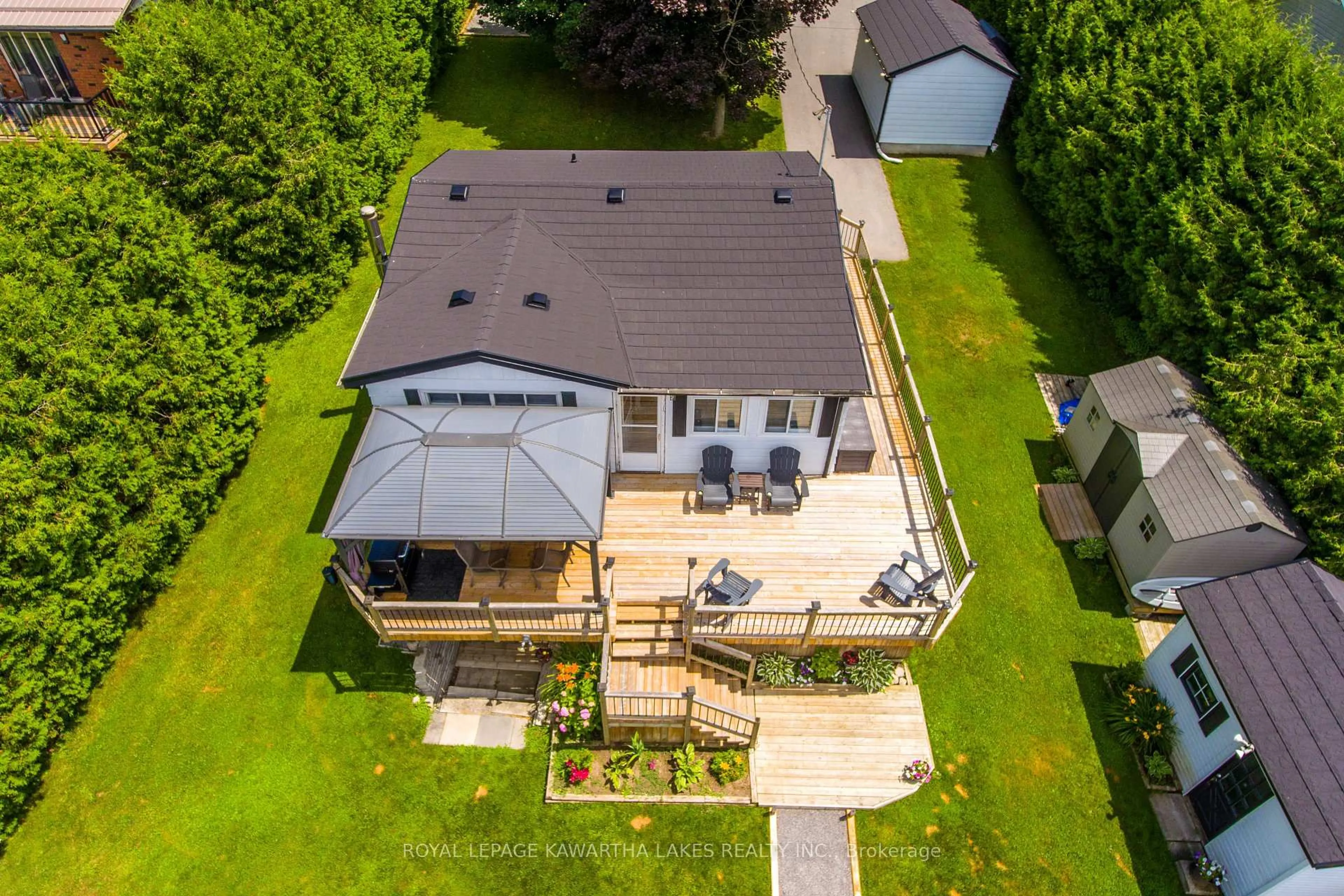 A pic from outside/outdoor area/front of a property/back of a property/a pic from drone, street for 28 Cadillac Blvd, Kawartha Lakes Ontario K0L 2W0