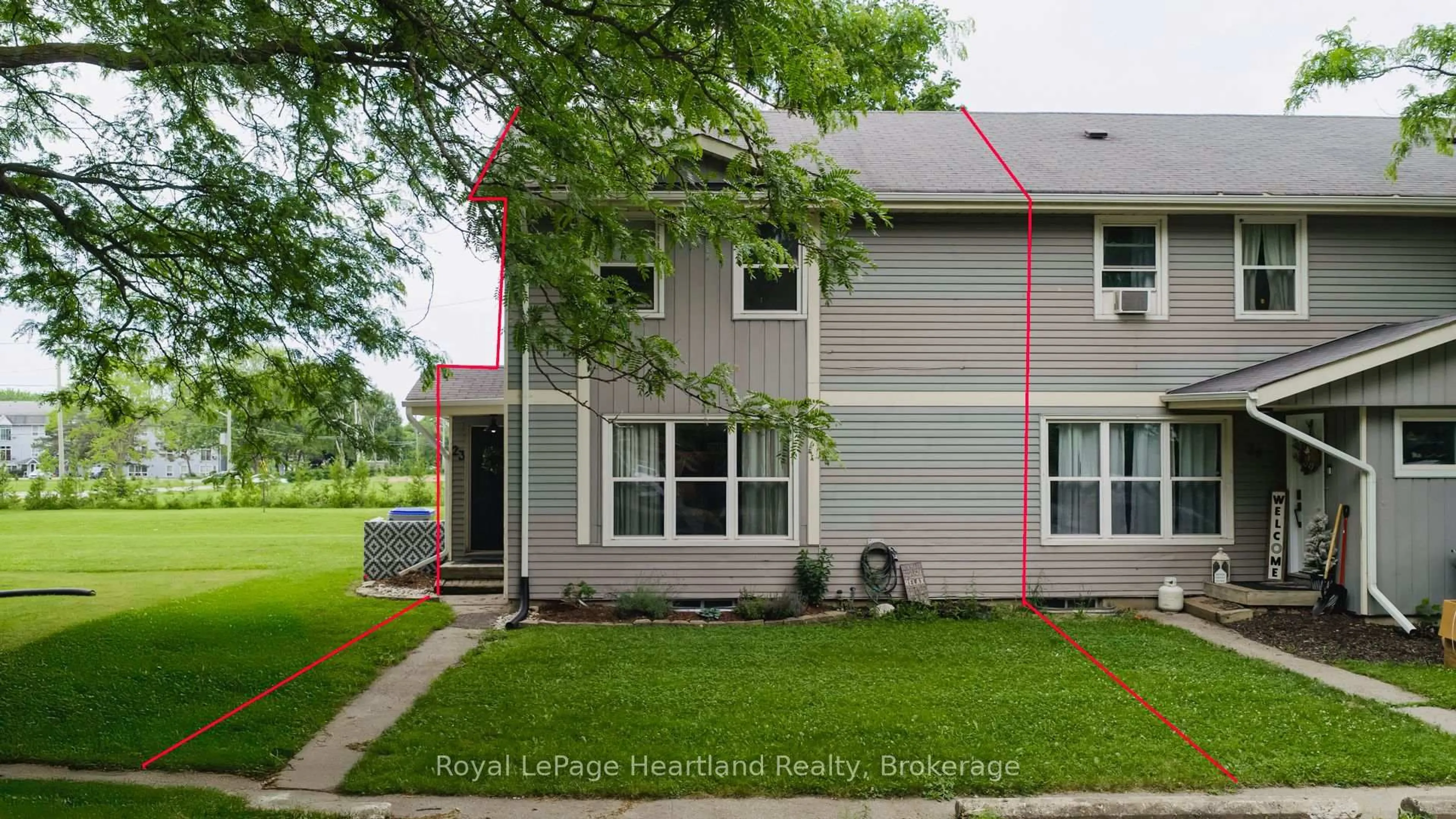 Home with vinyl exterior material, street for 23 St Charles Sq #23, Huron East Ontario N0M 1L0