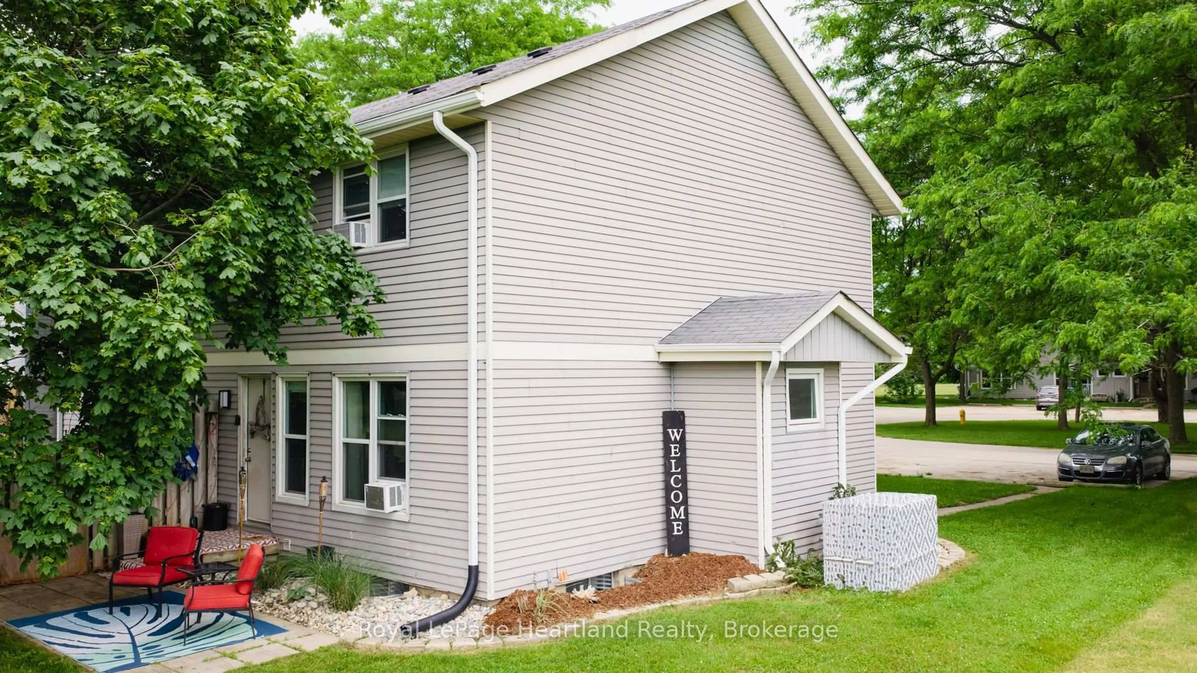 Home with vinyl exterior material, street for 23 St Charles Sq #23, Huron East Ontario N0M 1L0