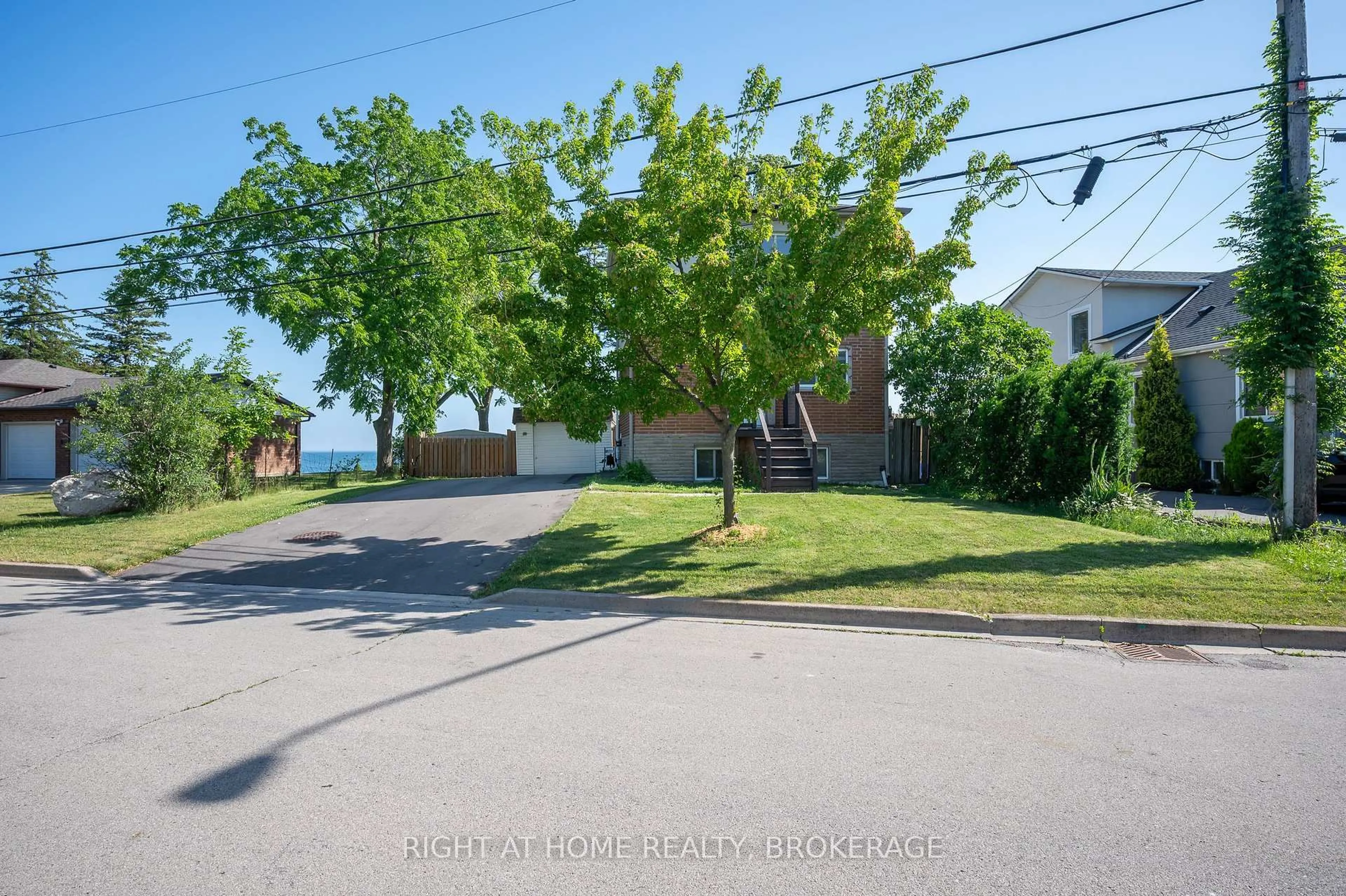 A pic from outside/outdoor area/front of a property/back of a property/a pic from drone, street for 74 Seabreeze Cres, Hamilton Ontario L8E 5C9