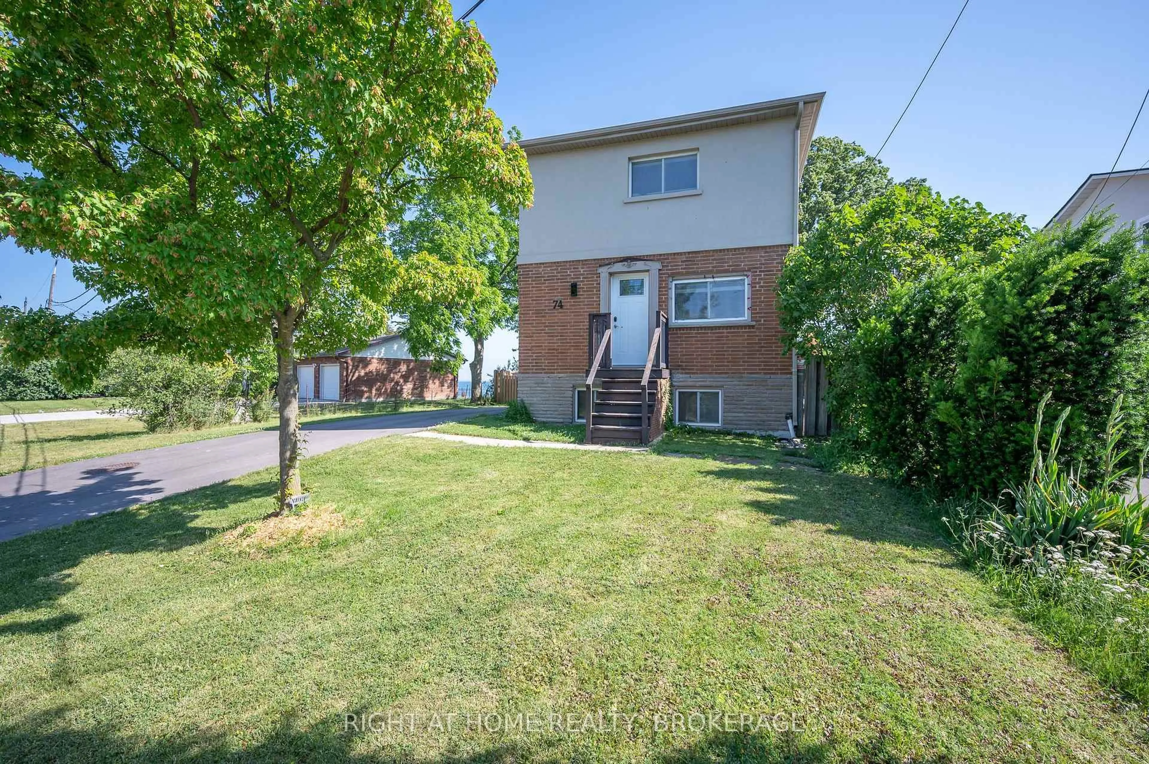 A pic from outside/outdoor area/front of a property/back of a property/a pic from drone, street for 74 Seabreeze Cres, Hamilton Ontario L8E 5C9