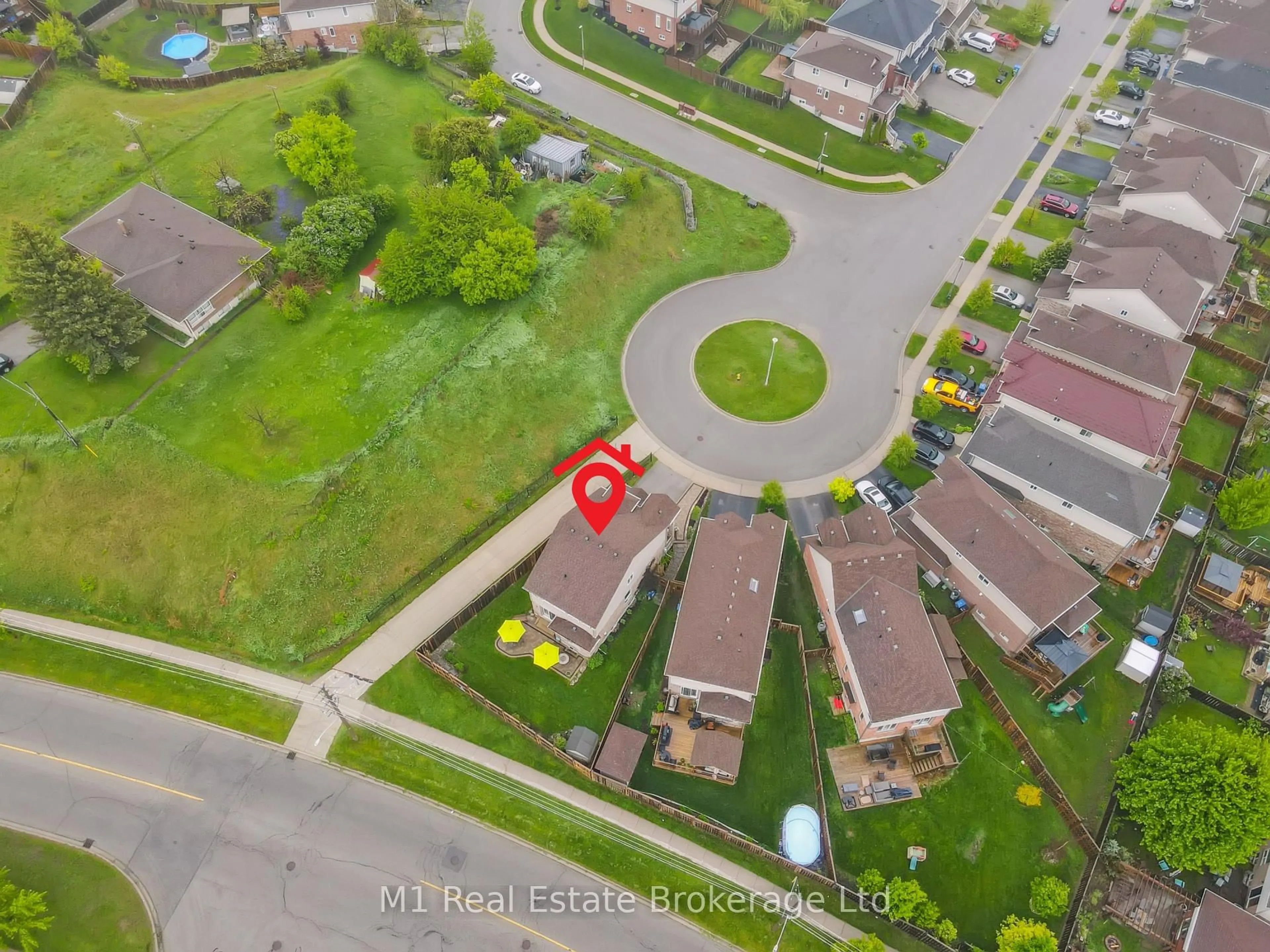 A pic from outside/outdoor area/front of a property/back of a property/a pic from drone, street for 12 Oakes Crt, Guelph Ontario N1E 0J6