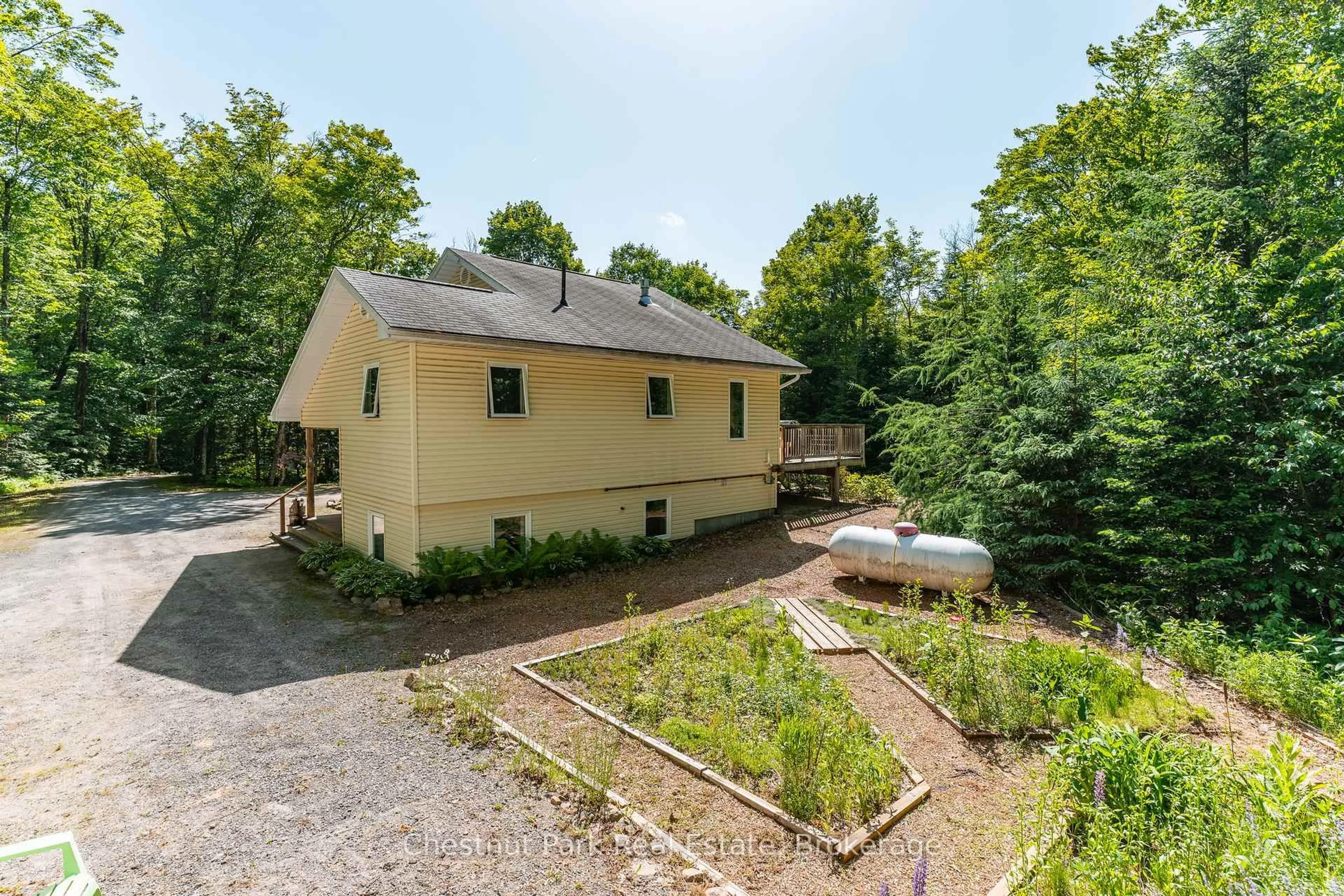 A pic from outside/outdoor area/front of a property/back of a property/a pic from drone, unknown for 1101 Harris Rd, Algonquin Highlands Ontario P0A 1H0