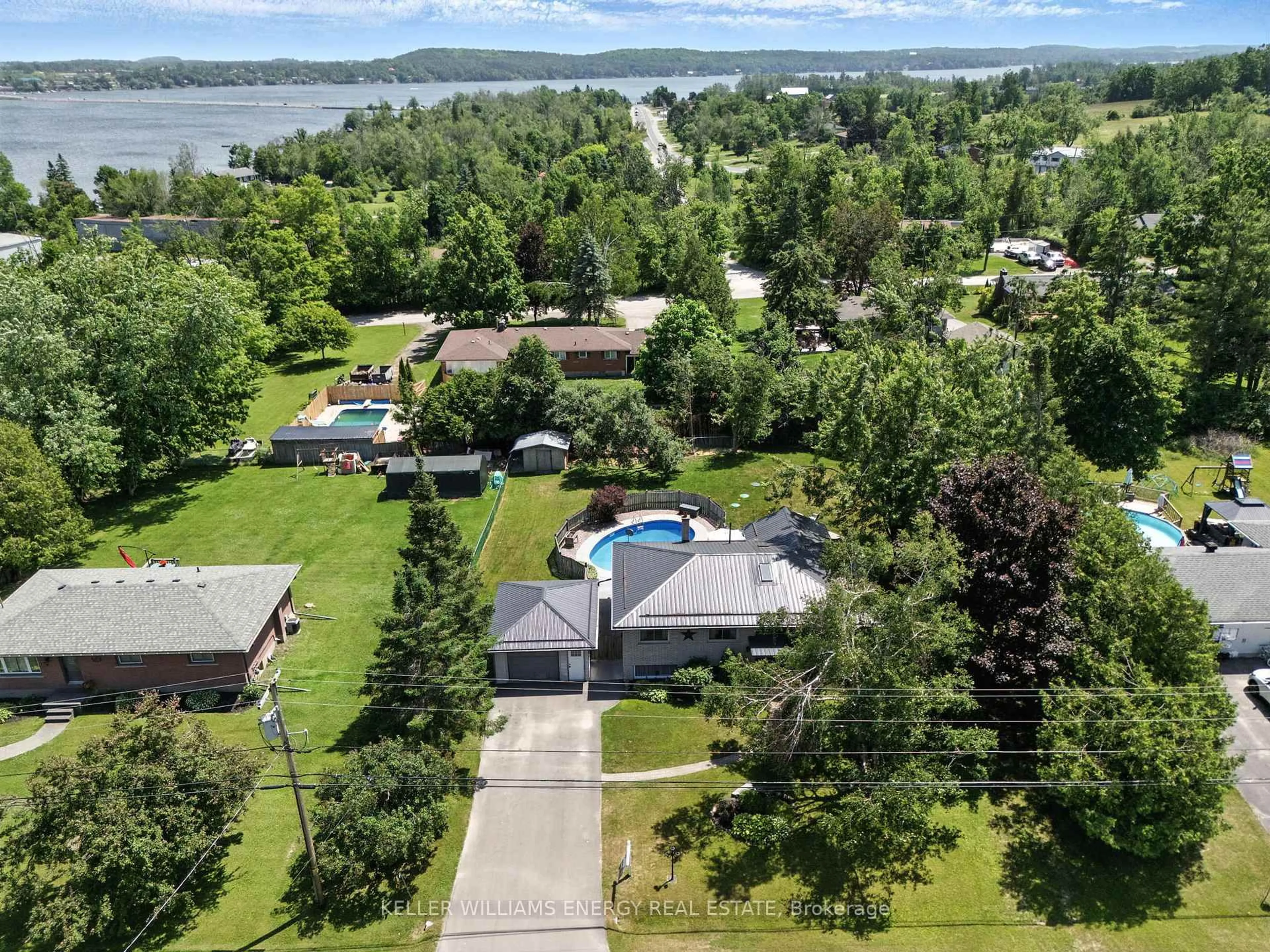 A pic from outside/outdoor area/front of a property/back of a property/a pic from drone, water/lake/river/ocean view for 685 Young St, Selwyn Ontario K9J 6X2