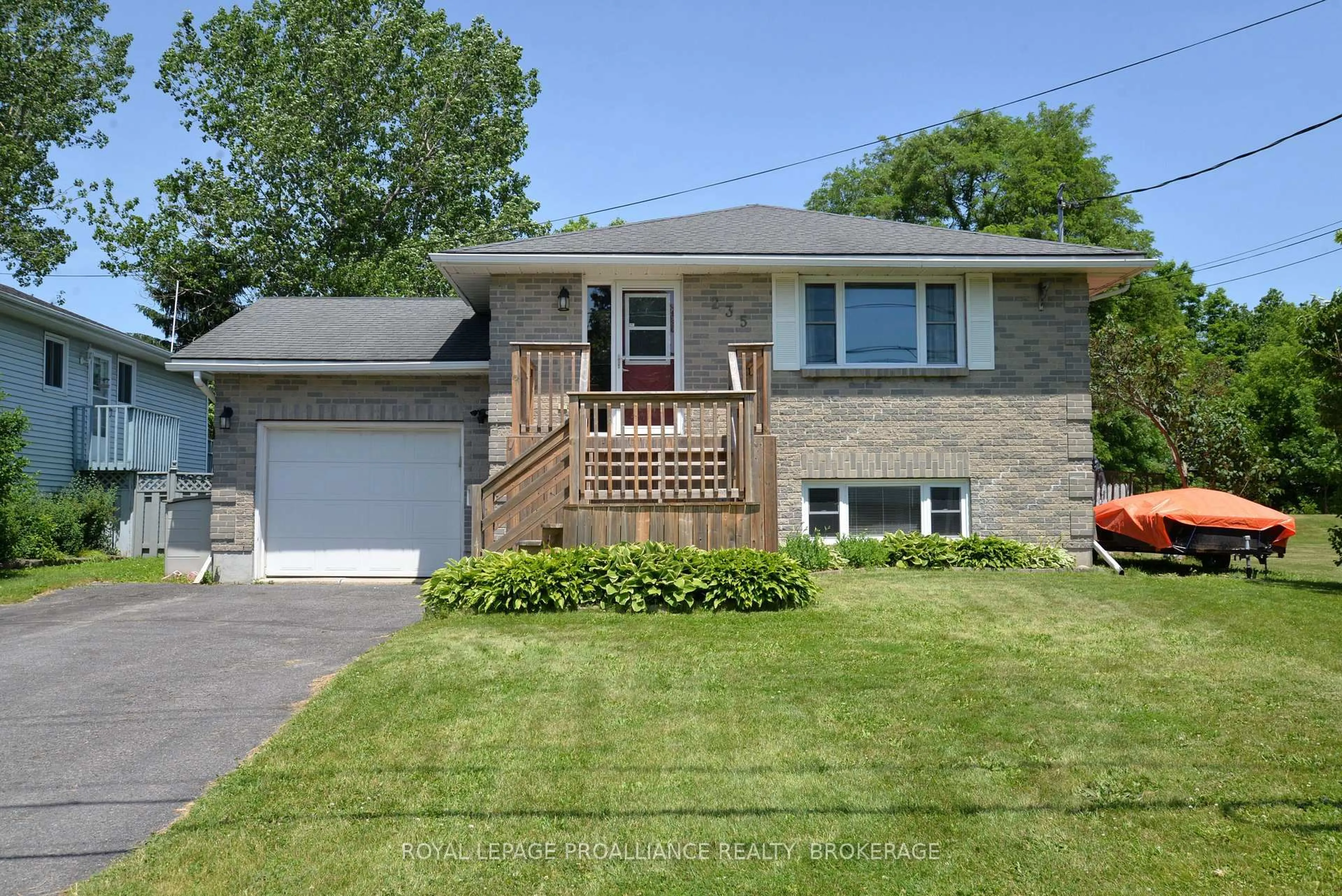 Home with brick exterior material, street for 235 Amherst Dr, Loyalist Ontario K7N 1V3