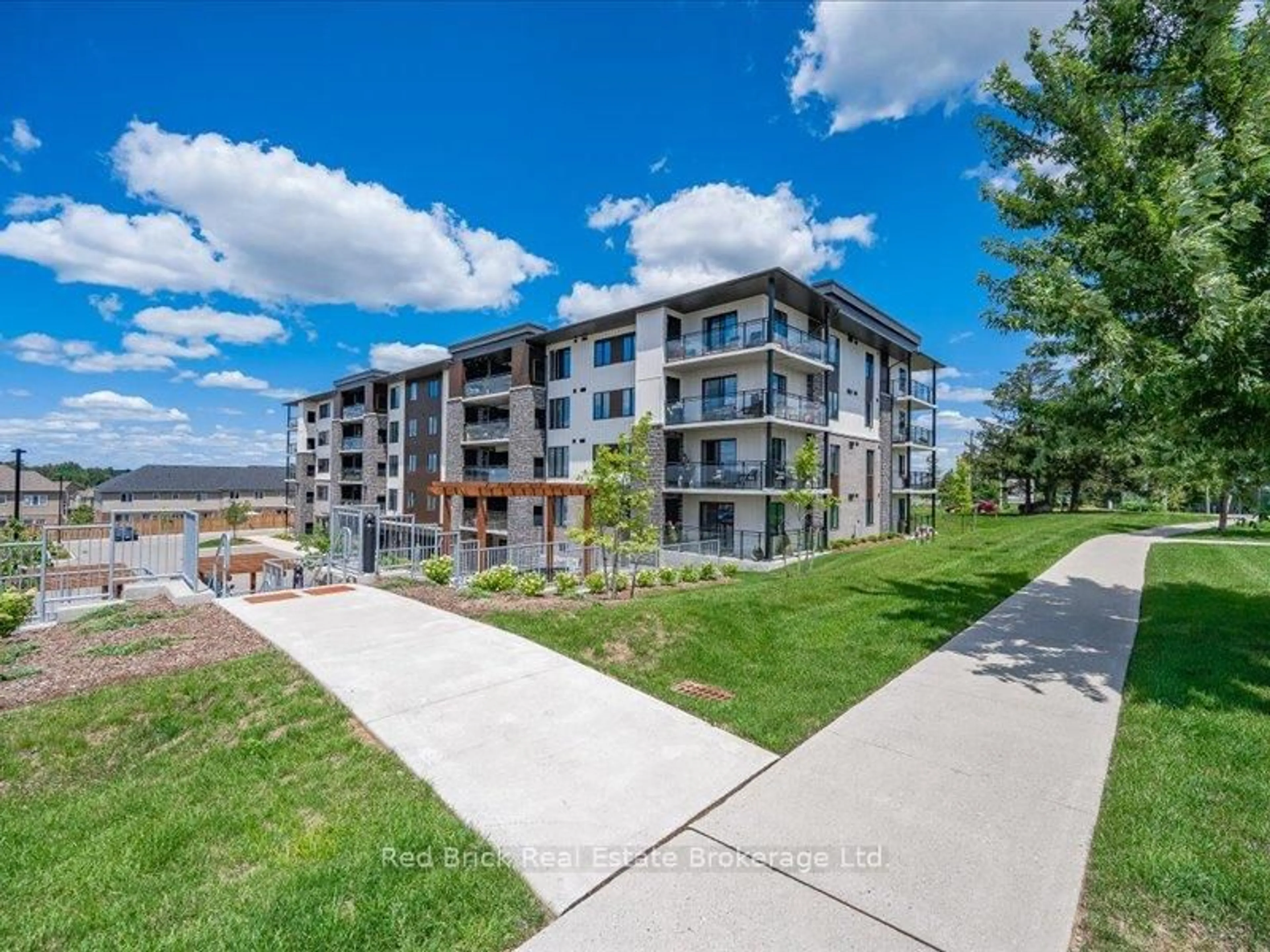 A pic from outside/outdoor area/front of a property/back of a property/a pic from drone, unknown for 104 Summit Ridge Dr #003, Guelph Ontario N1E 0R5
