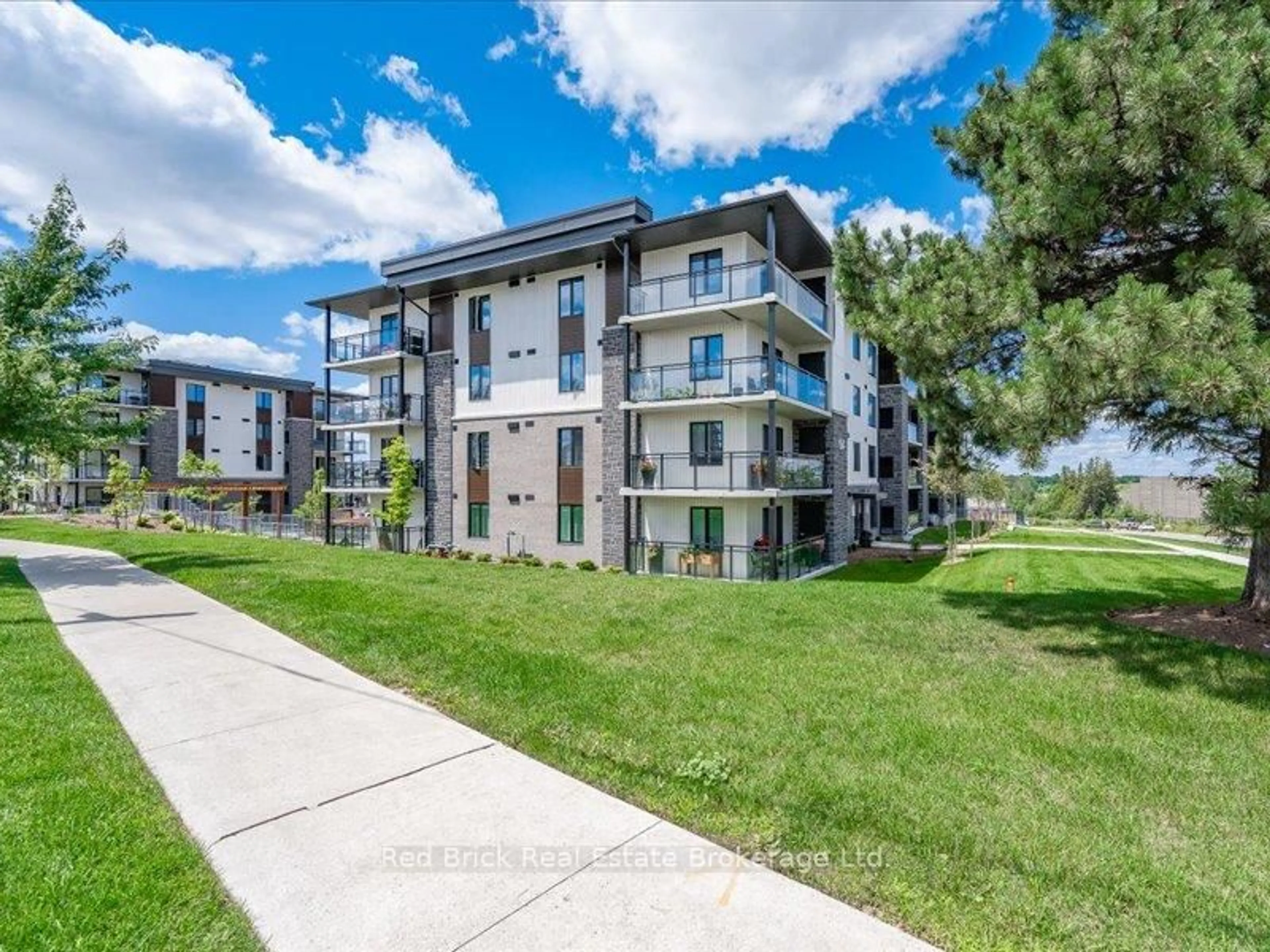 A pic from outside/outdoor area/front of a property/back of a property/a pic from drone, unknown for 104 Summit Ridge Dr #003, Guelph Ontario N1E 0R5