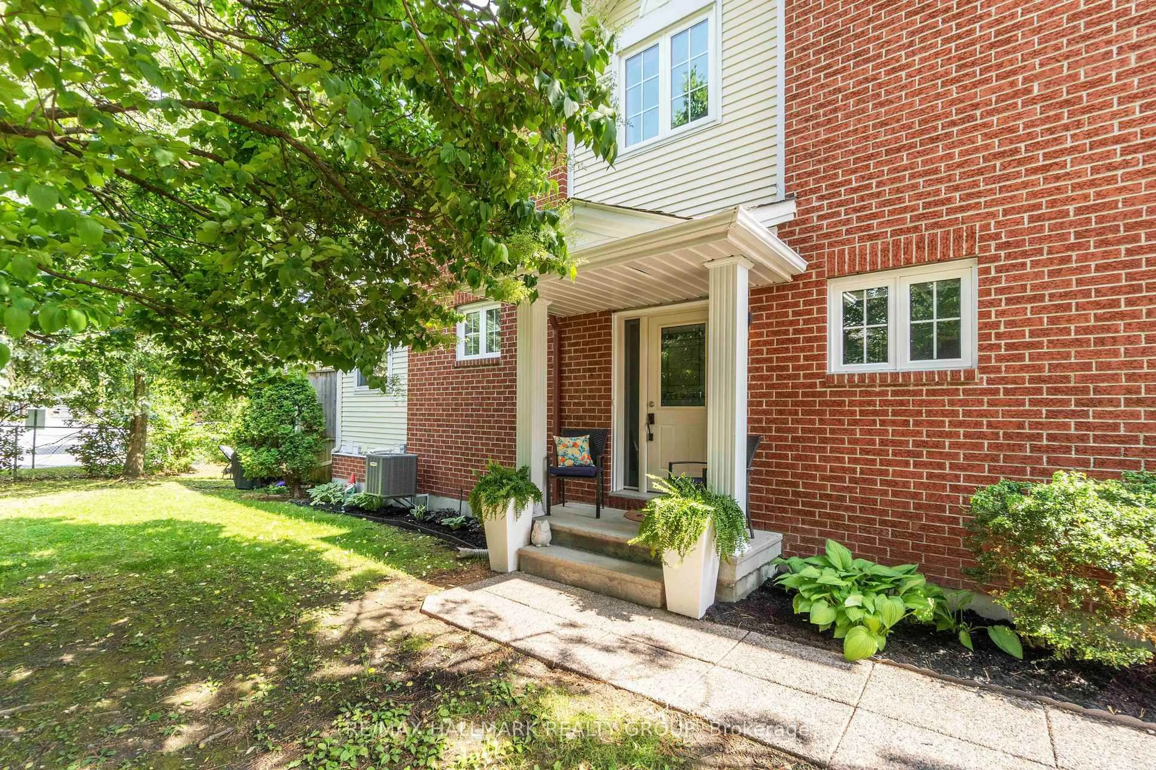 Home with brick exterior material, street for 121 Stonebriar Dr #14, Ottawa Ontario K2G 5Y1