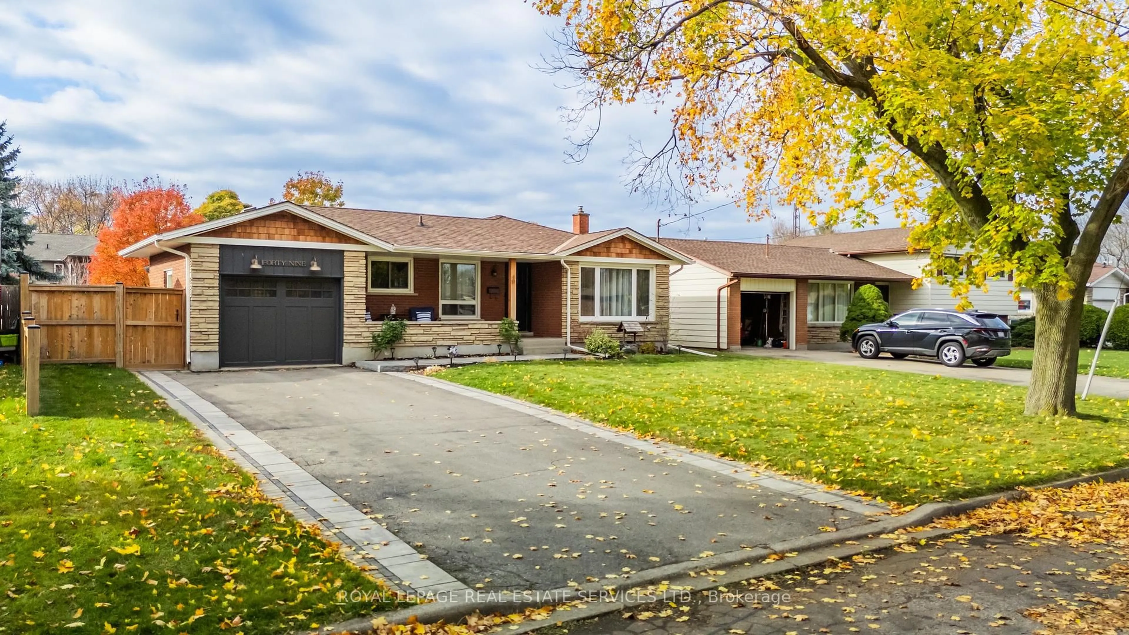 Home with brick exterior material, street for 49 Royal Manor Dr, St. Catharines Ontario L2M 4L2
