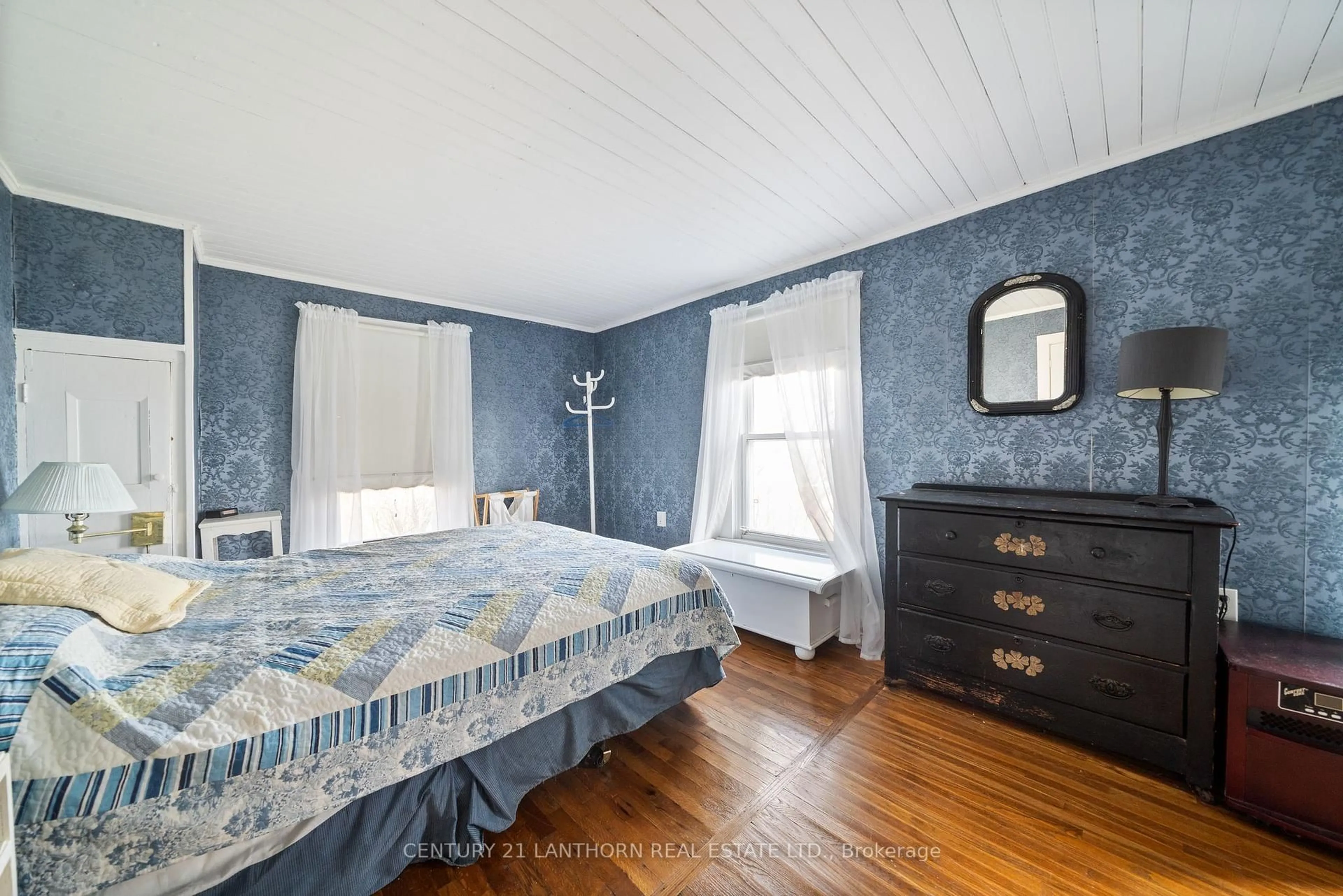 Bedroom with bed, wood/laminate floor for 129 Cressy Lakeside Rd, Prince Edward County Ontario K0K 2T0