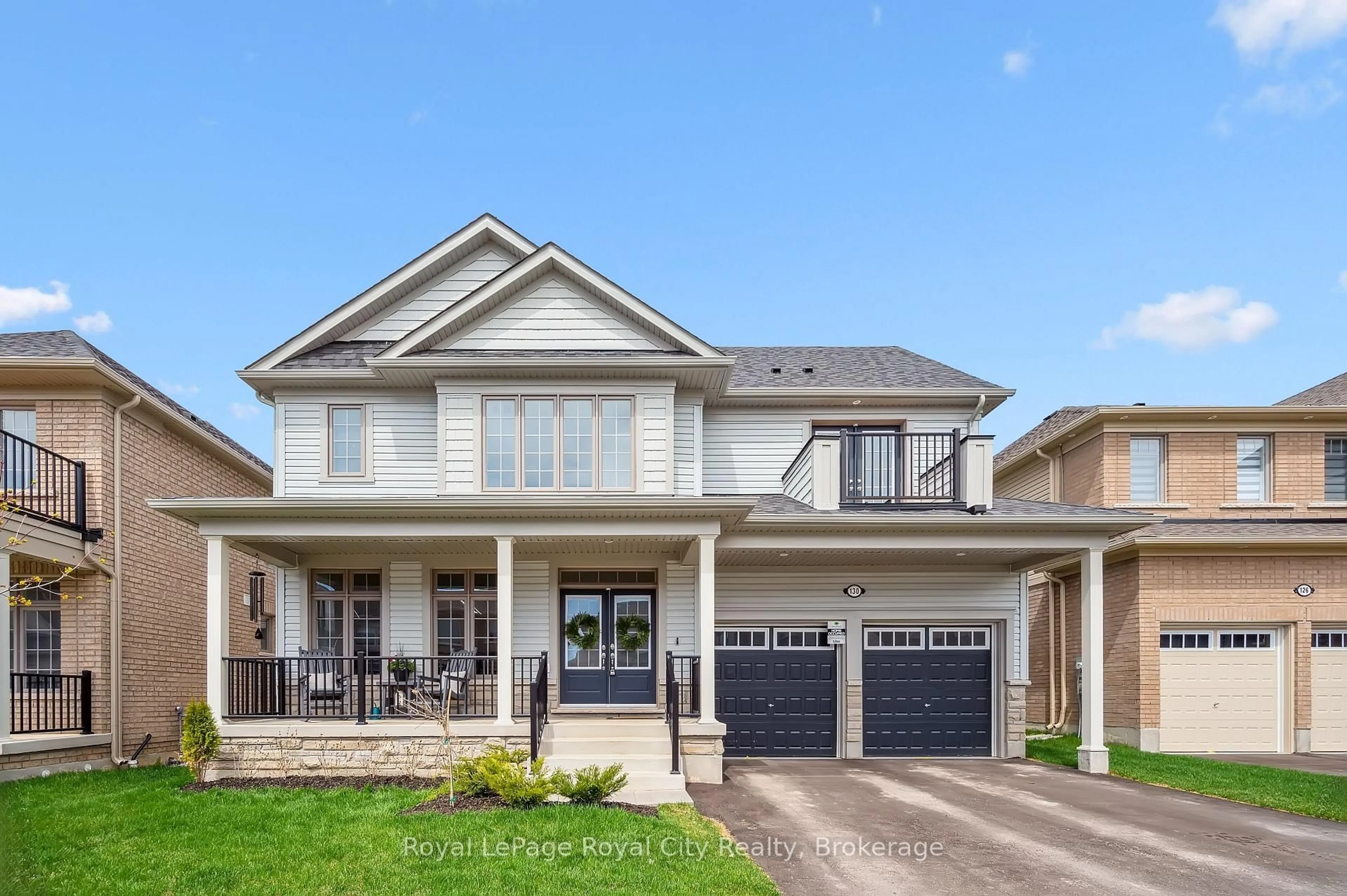 Home with vinyl exterior material, street for 130 Rea Dr, Centre Wellington Ontario N1M 0J8
