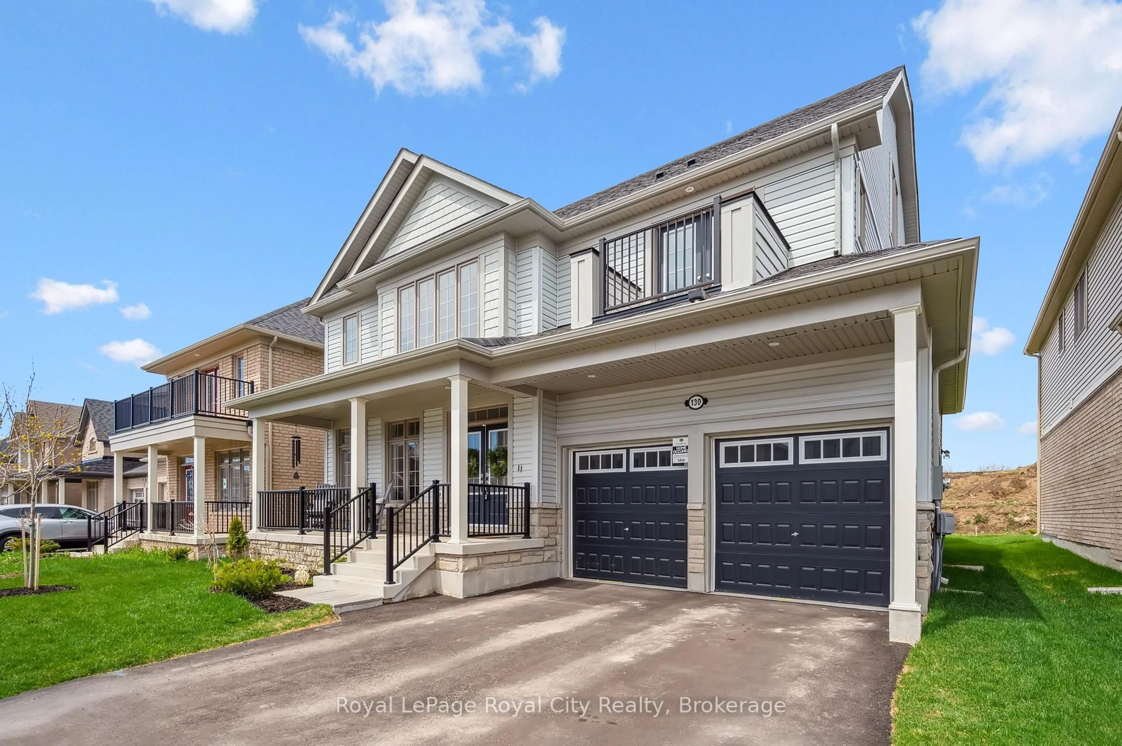 Home with vinyl exterior material, street for 130 Rea Dr, Centre Wellington Ontario N1M 0J8