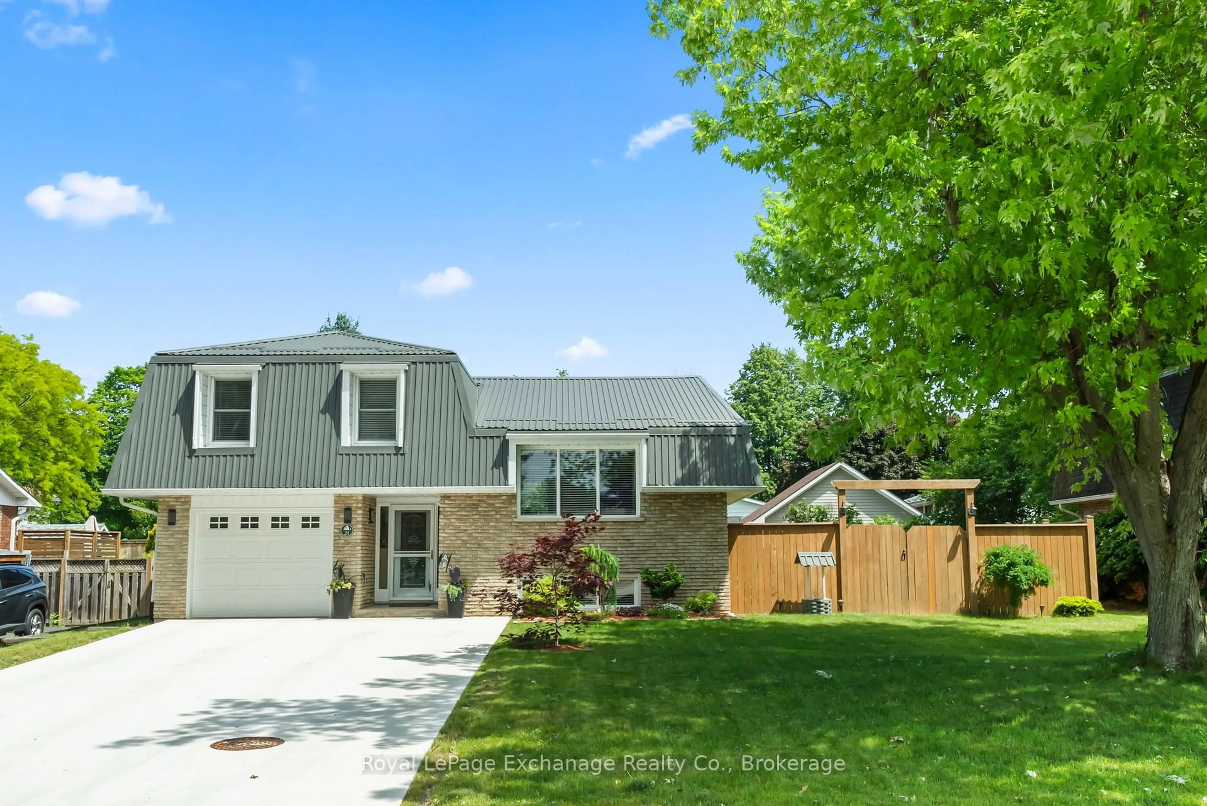 Home with vinyl exterior material, street for 21 Penetangore Row, Huron-Kinloss Ontario N2Z 2M3