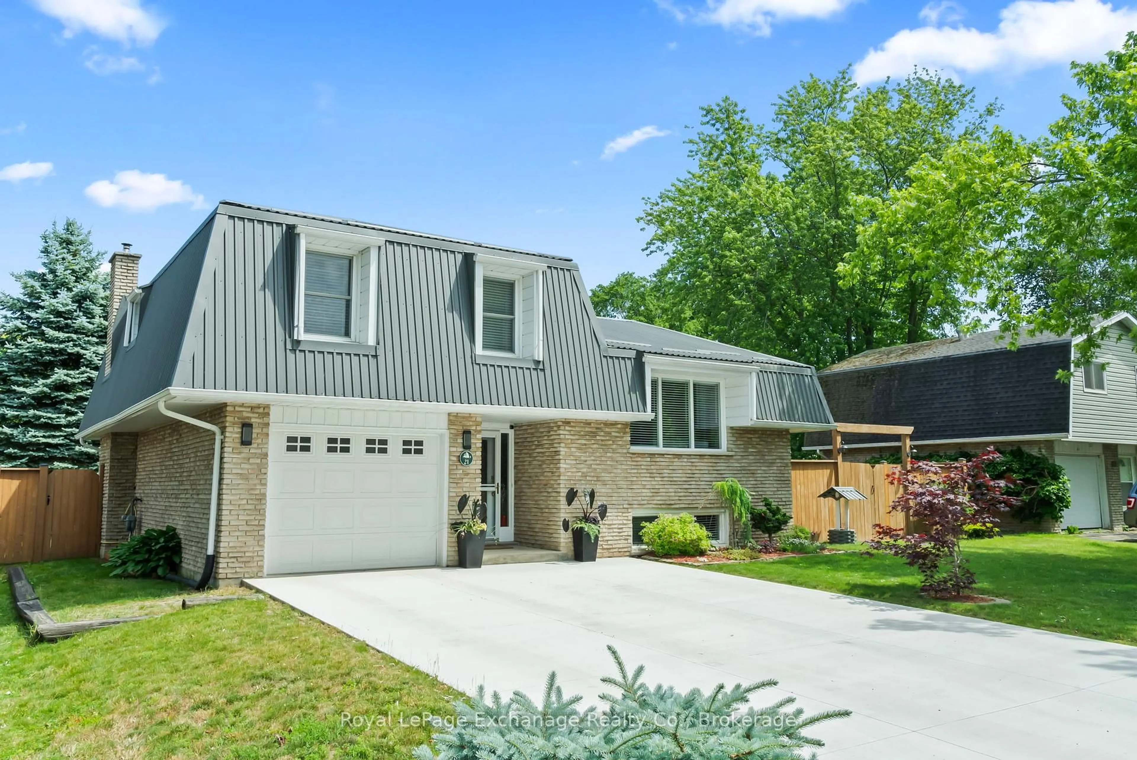 Home with vinyl exterior material, street for 21 Penetangore Row, Huron-Kinloss Ontario N2Z 2M3
