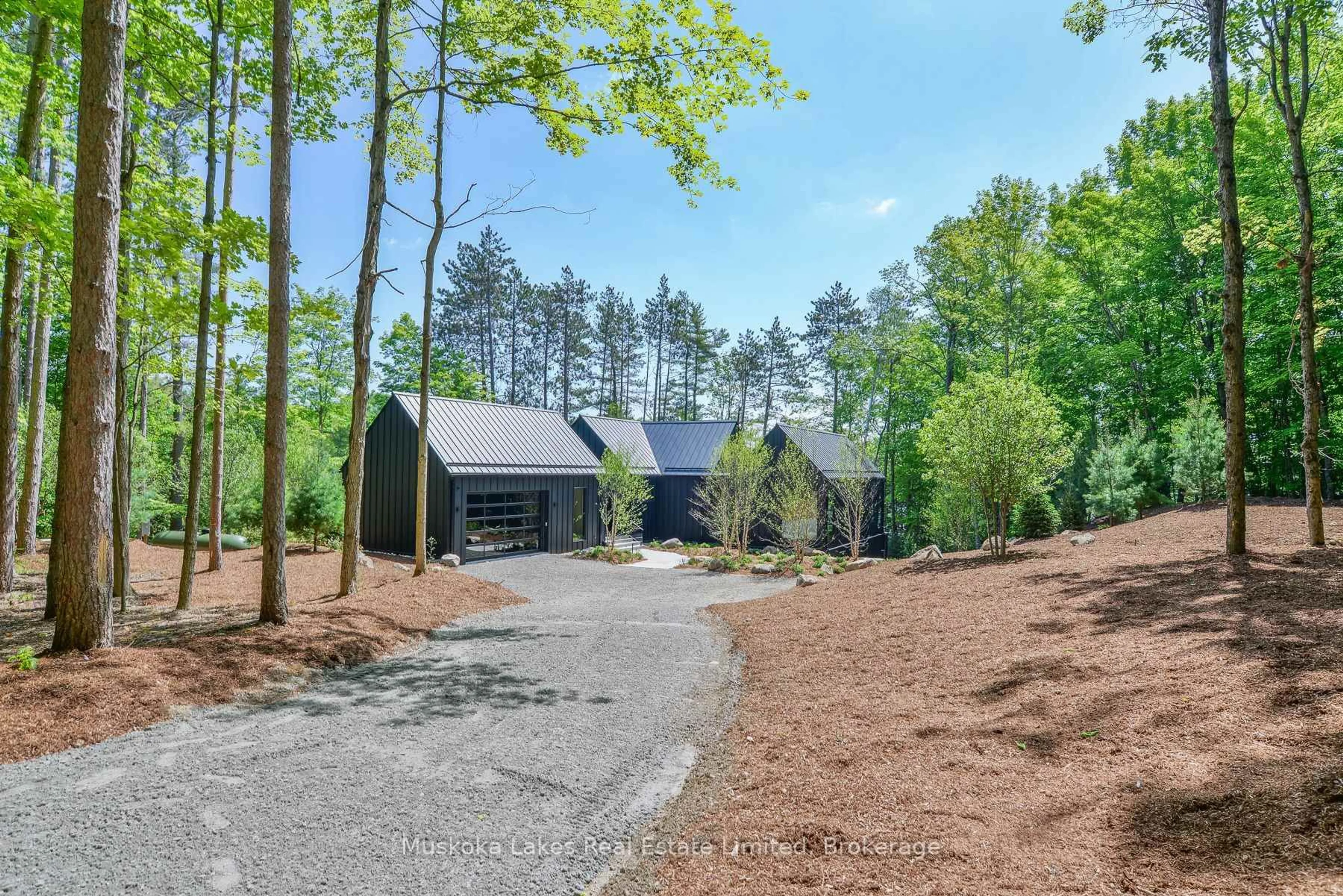 A pic from outside/outdoor area/front of a property/back of a property/a pic from drone, forest/trees view for 1074 Woodington Rd #Unit 1, Muskoka Lakes Ontario P0B 1J0