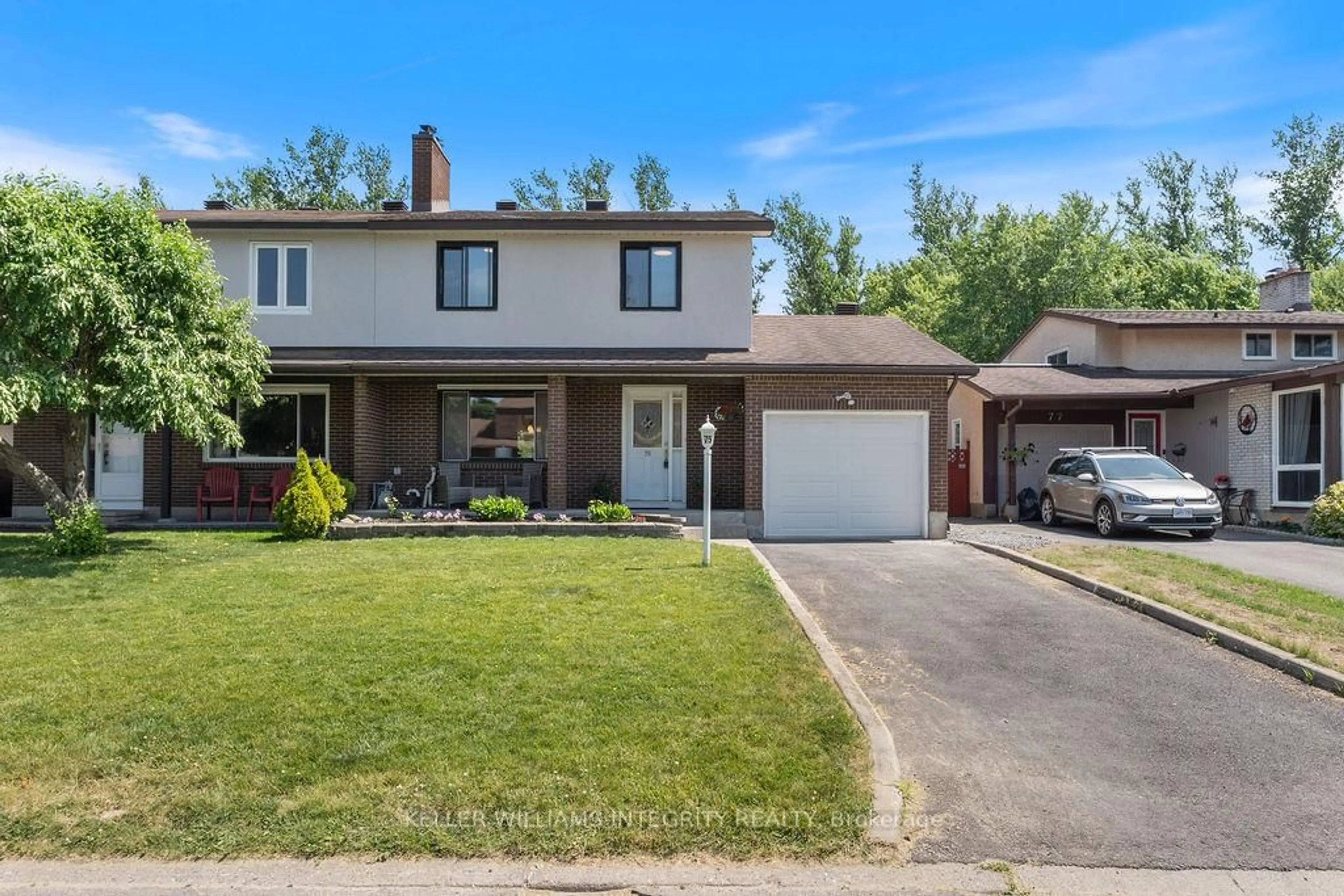 Home with brick exterior material, street for 75 Downsview Cres, Ottawa Ontario K2G 0A4