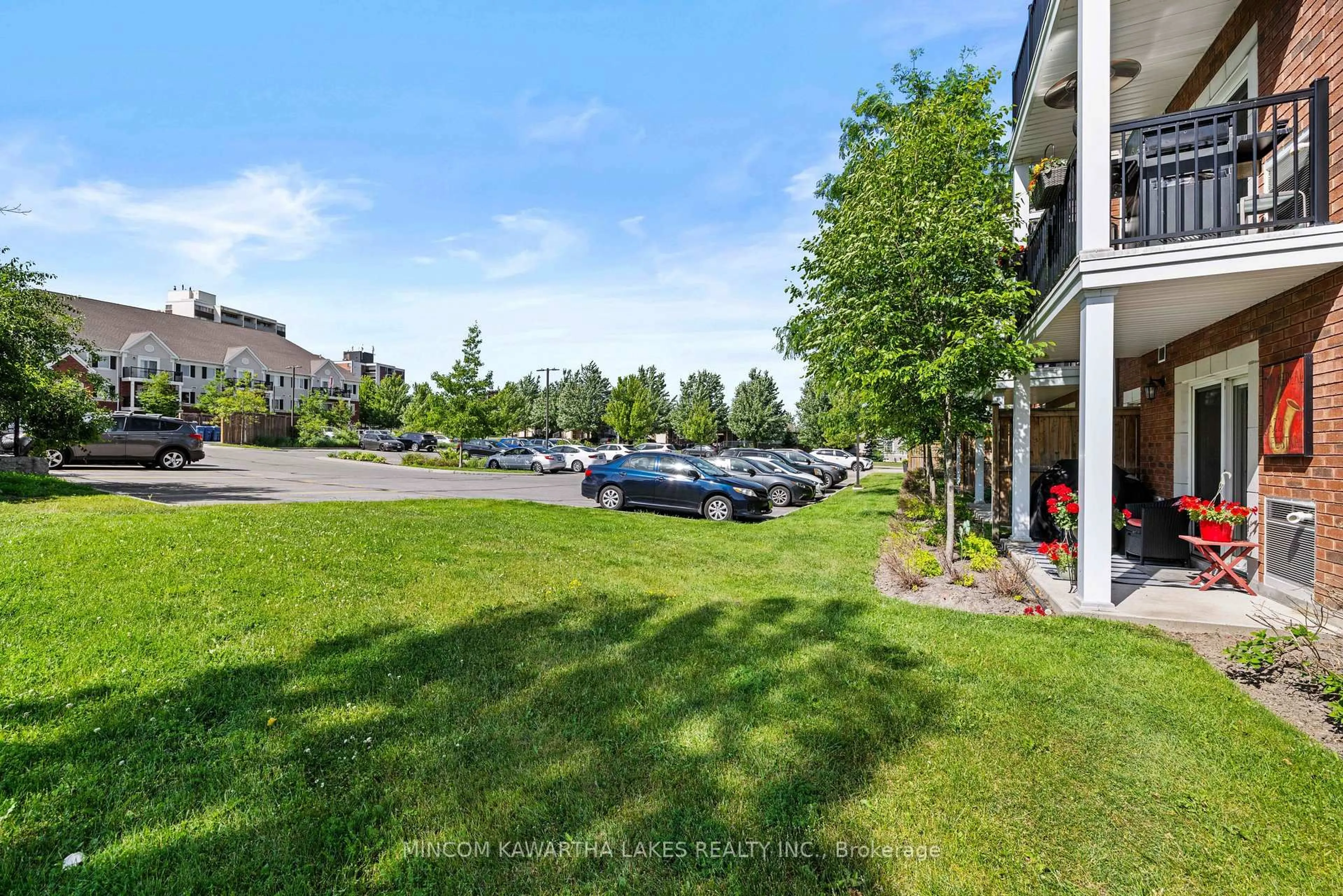 A pic from outside/outdoor area/front of a property/back of a property/a pic from drone, unknown for 910 Wentworth St #105, Peterborough West Ontario K9J 8R8