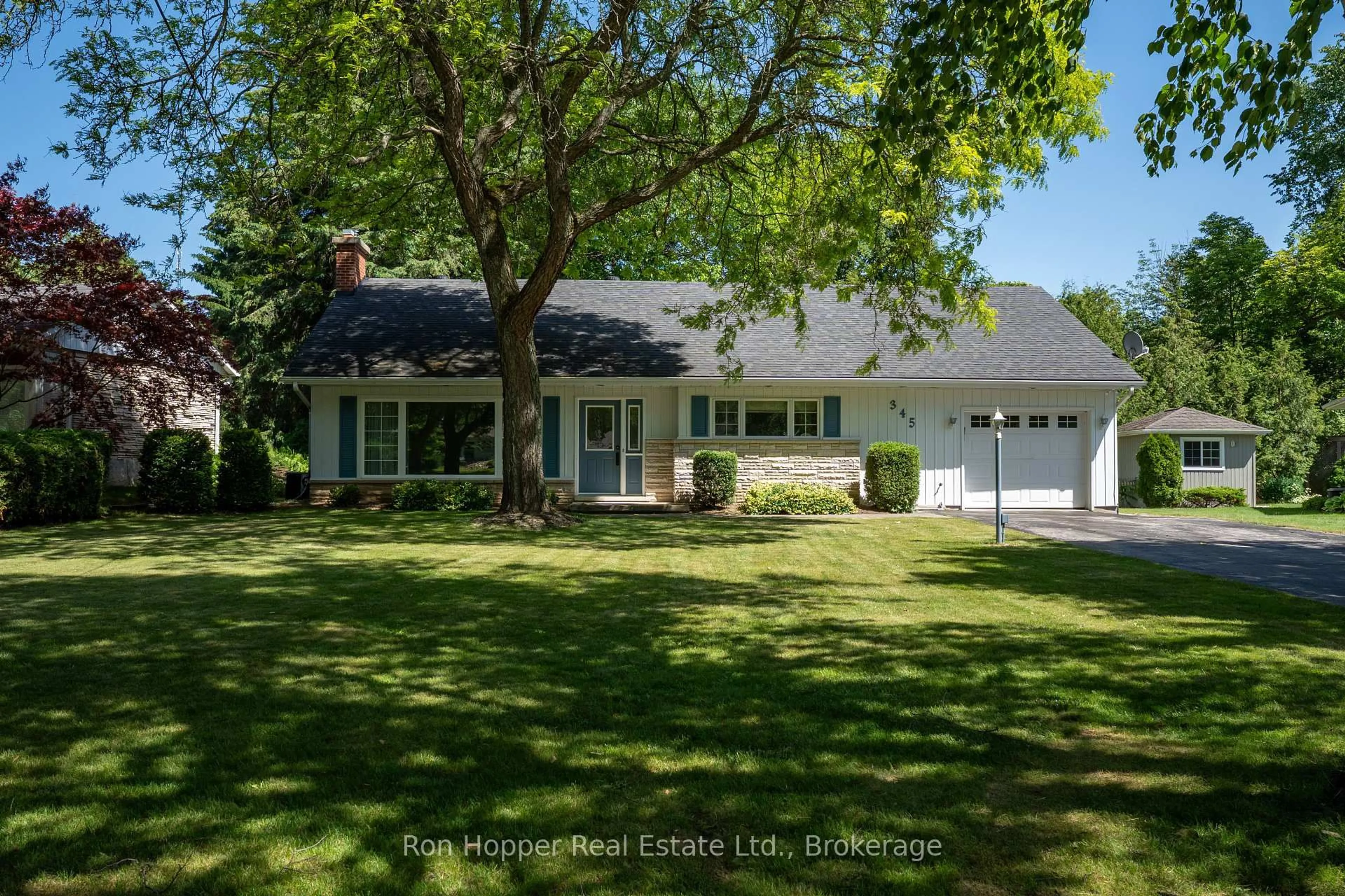 Home with vinyl exterior material, street for 345 6th Ave, Owen Sound Ontario N4K 2T7