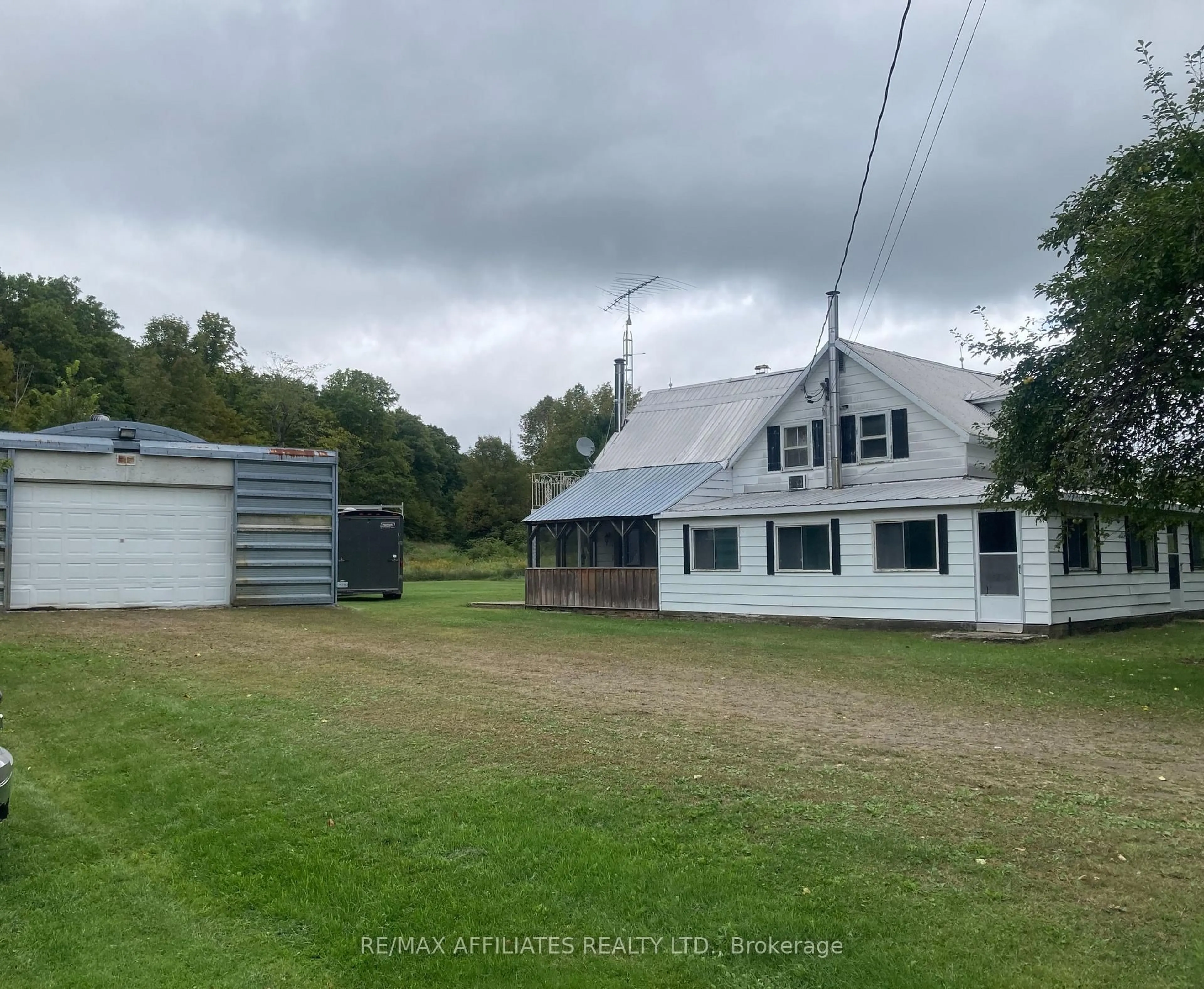 A pic from outside/outdoor area/front of a property/back of a property/a pic from drone, building for 1018 Folger Rd, Ompah Ontario K0H 2J0